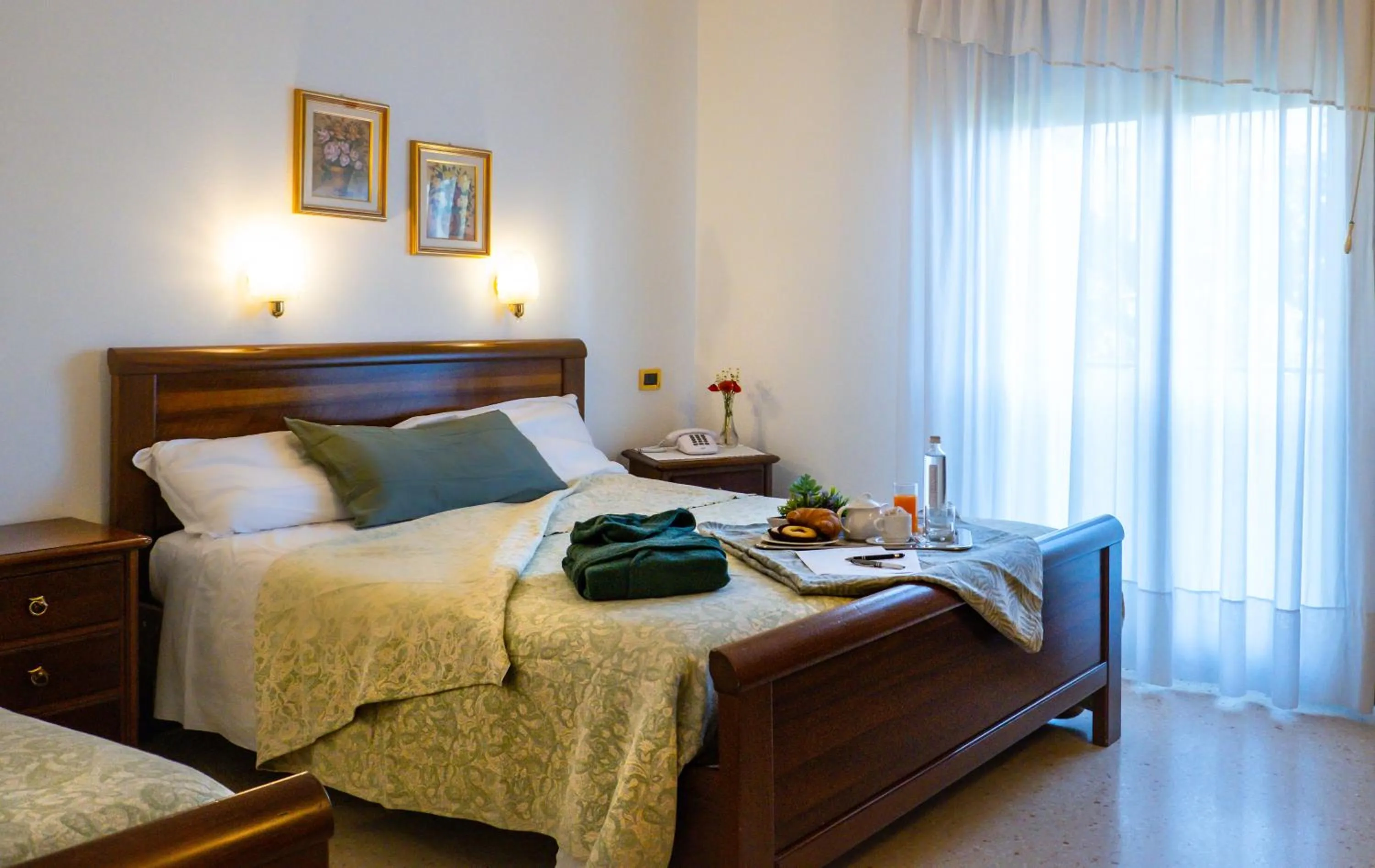 Bed in Hotel Da Gigi