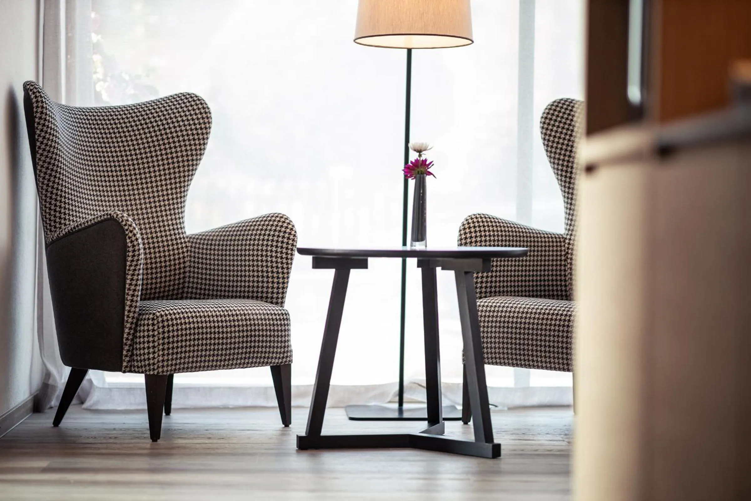 Communal lounge/ TV room in B&B Boutiquehotel Clara