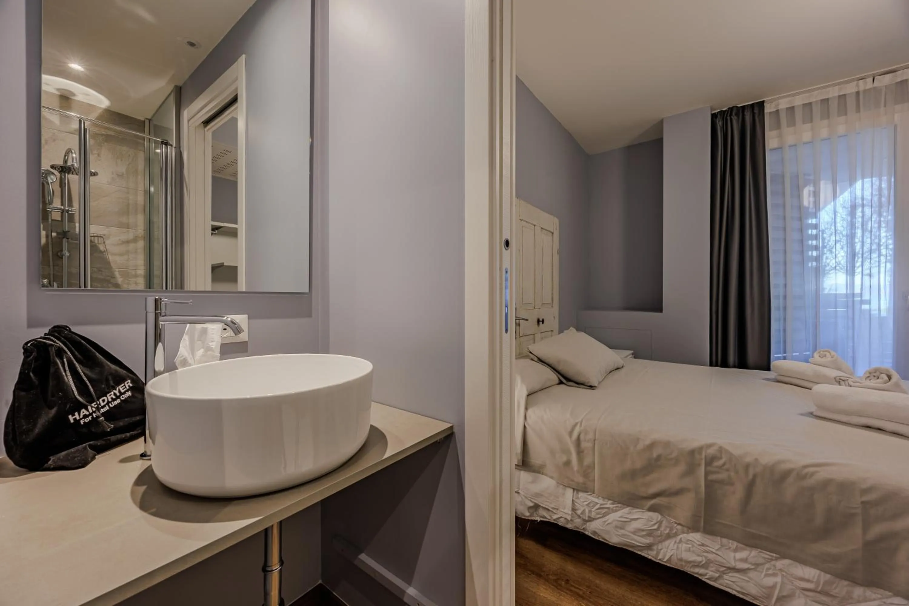 Bed in Hotel Maximilian