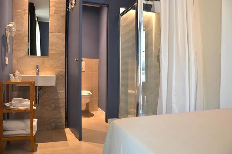 Bed in Hotel Maximilian