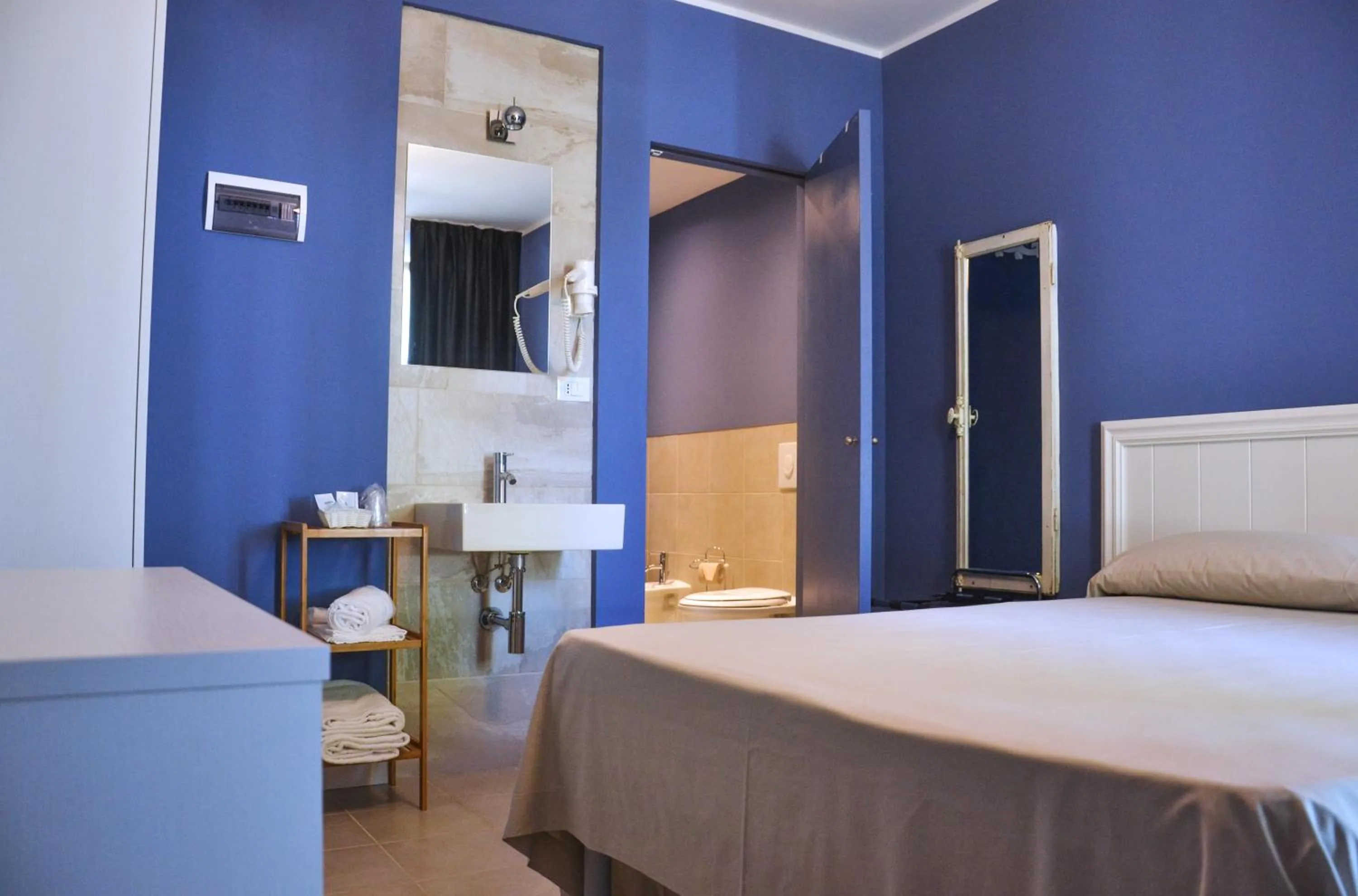 Bed in Hotel Maximilian