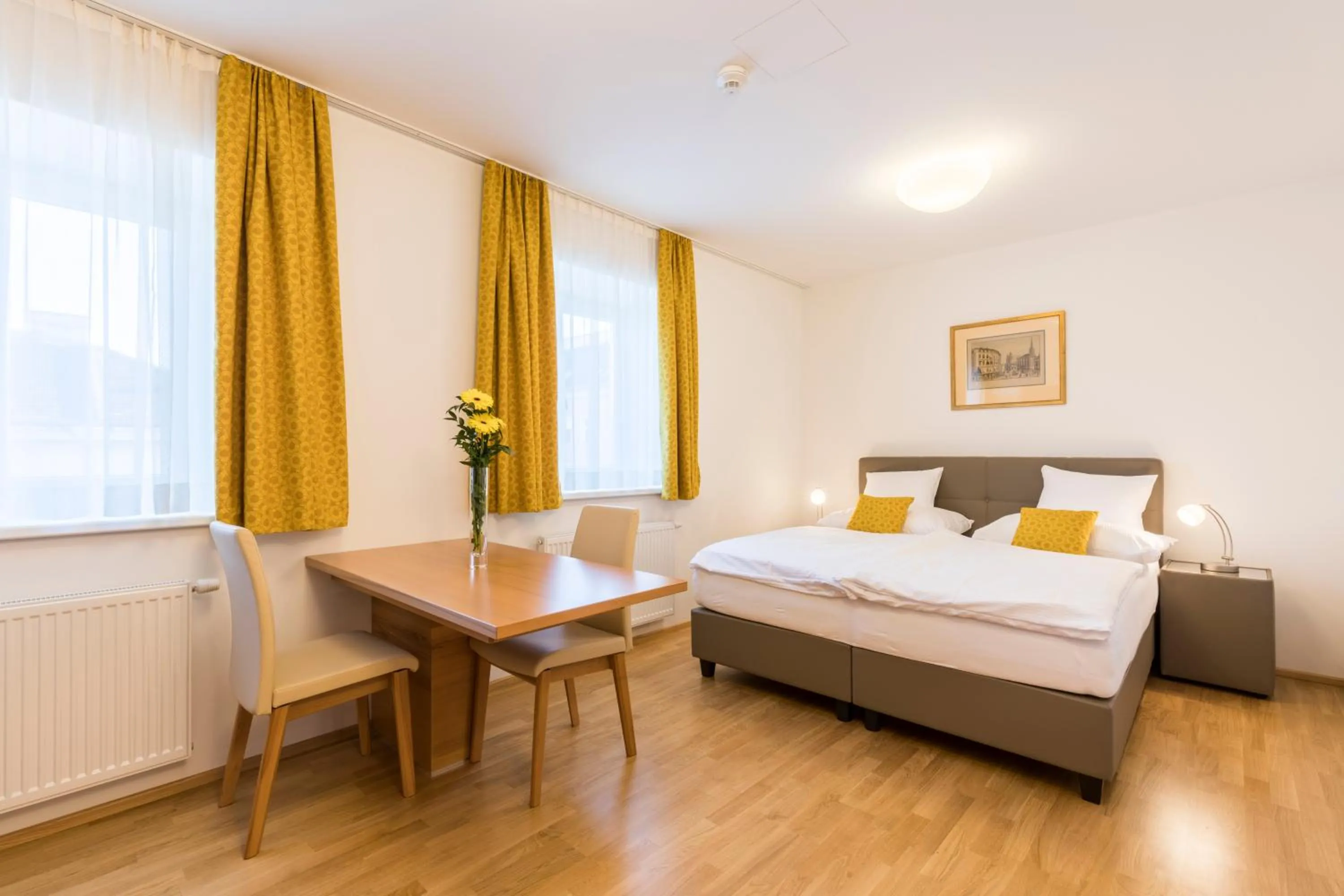 Seating area, Bed in Vienna Grand Apartments City