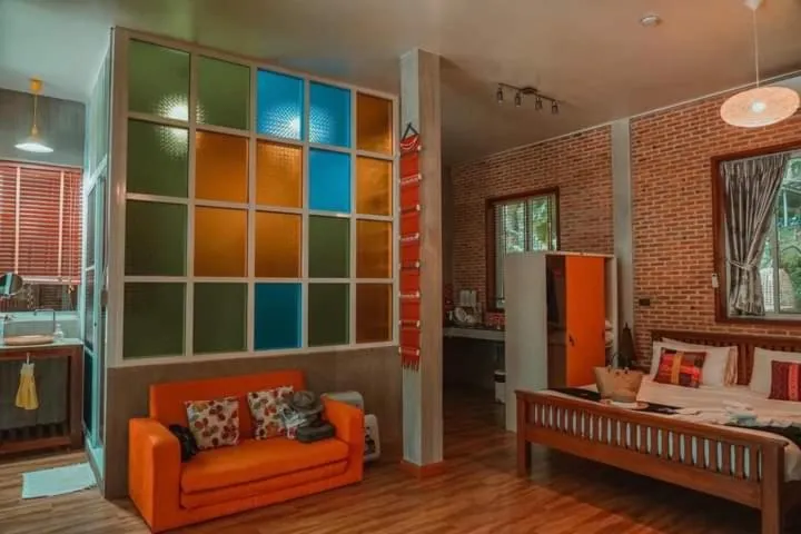 Bed in Nan De Panna Resort and Spa