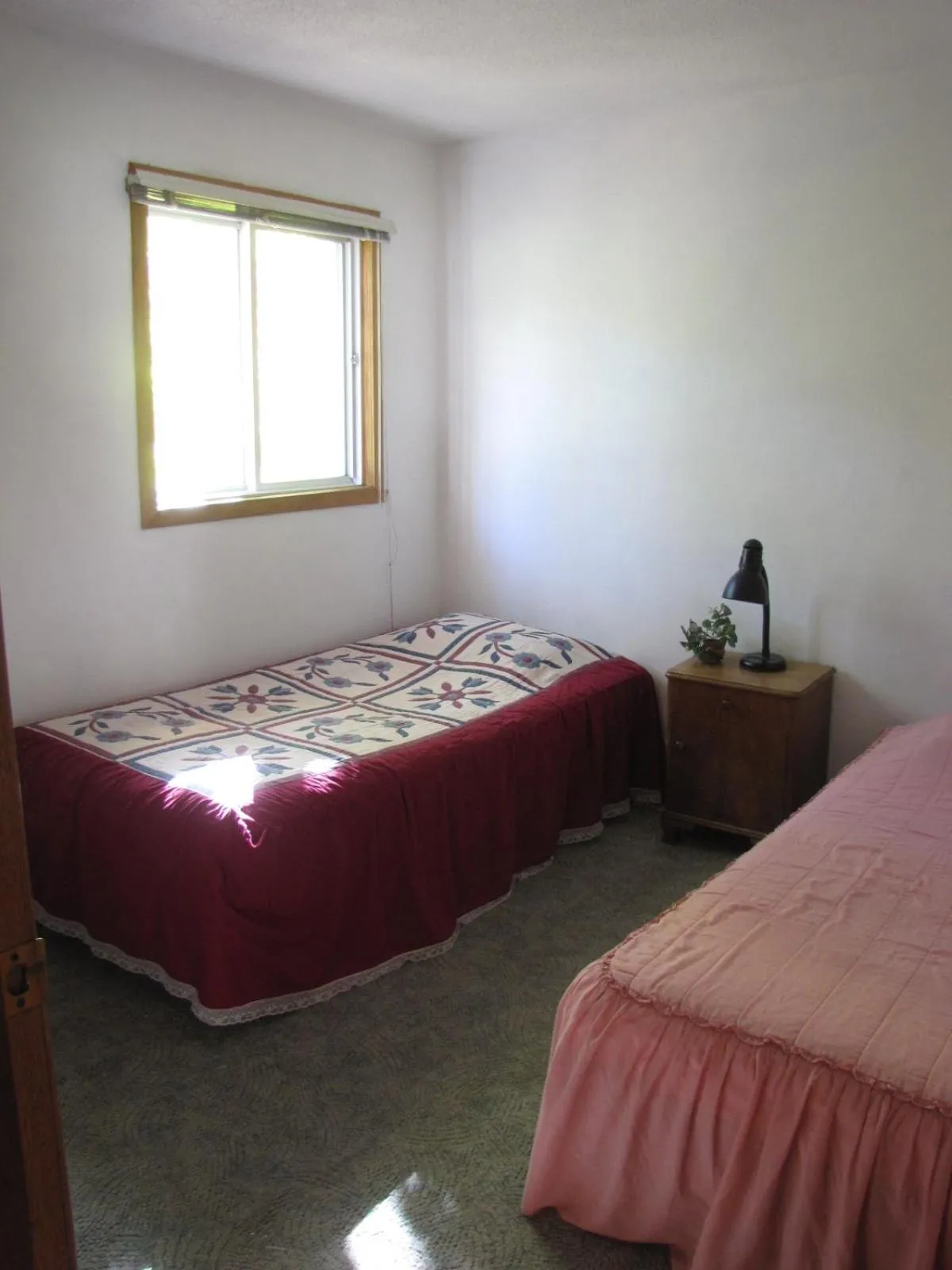 Bed in Quiet Bay Inn & Café