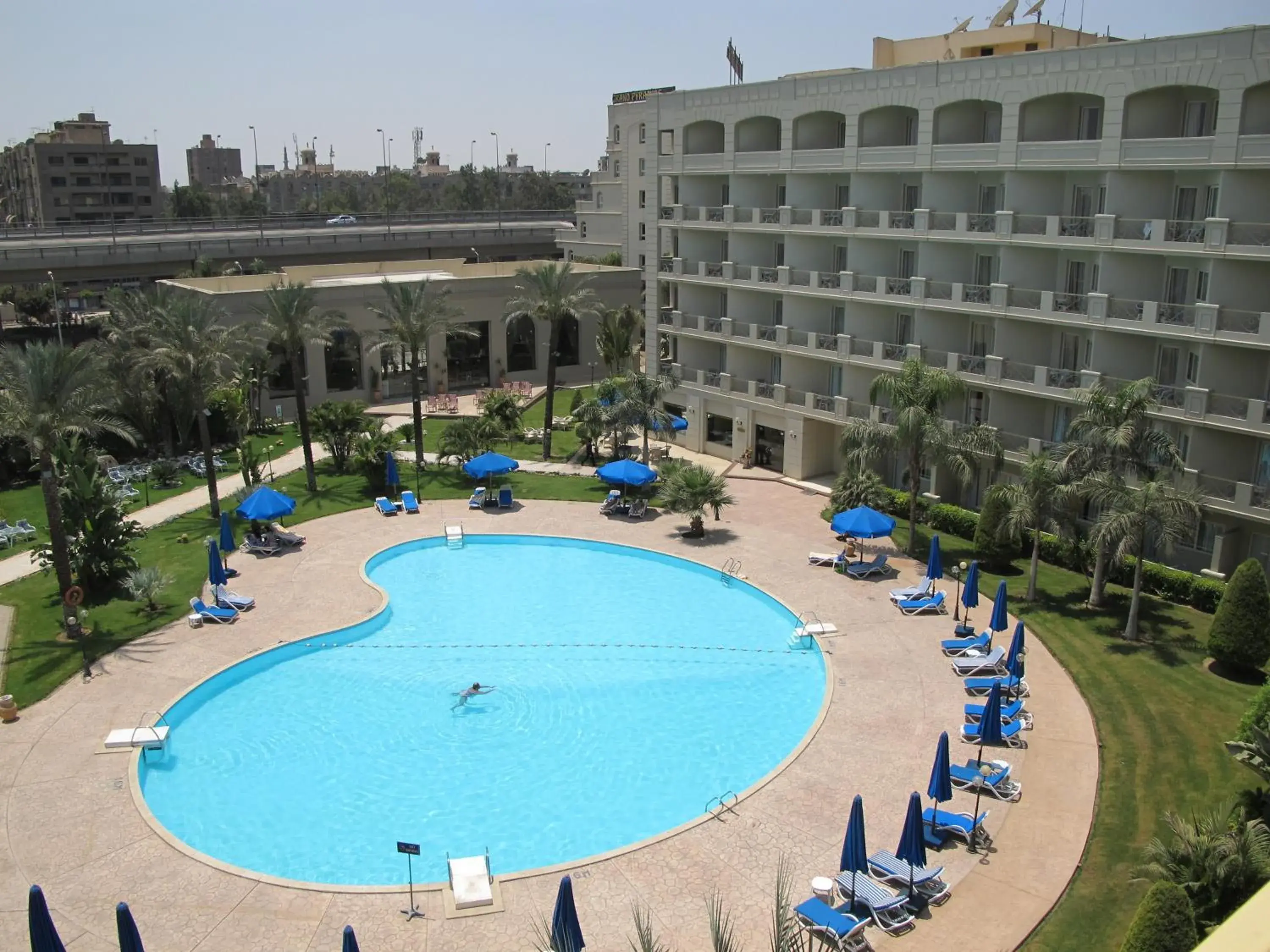 Swimming pool, Pool View in Grand Pyramids Hotel