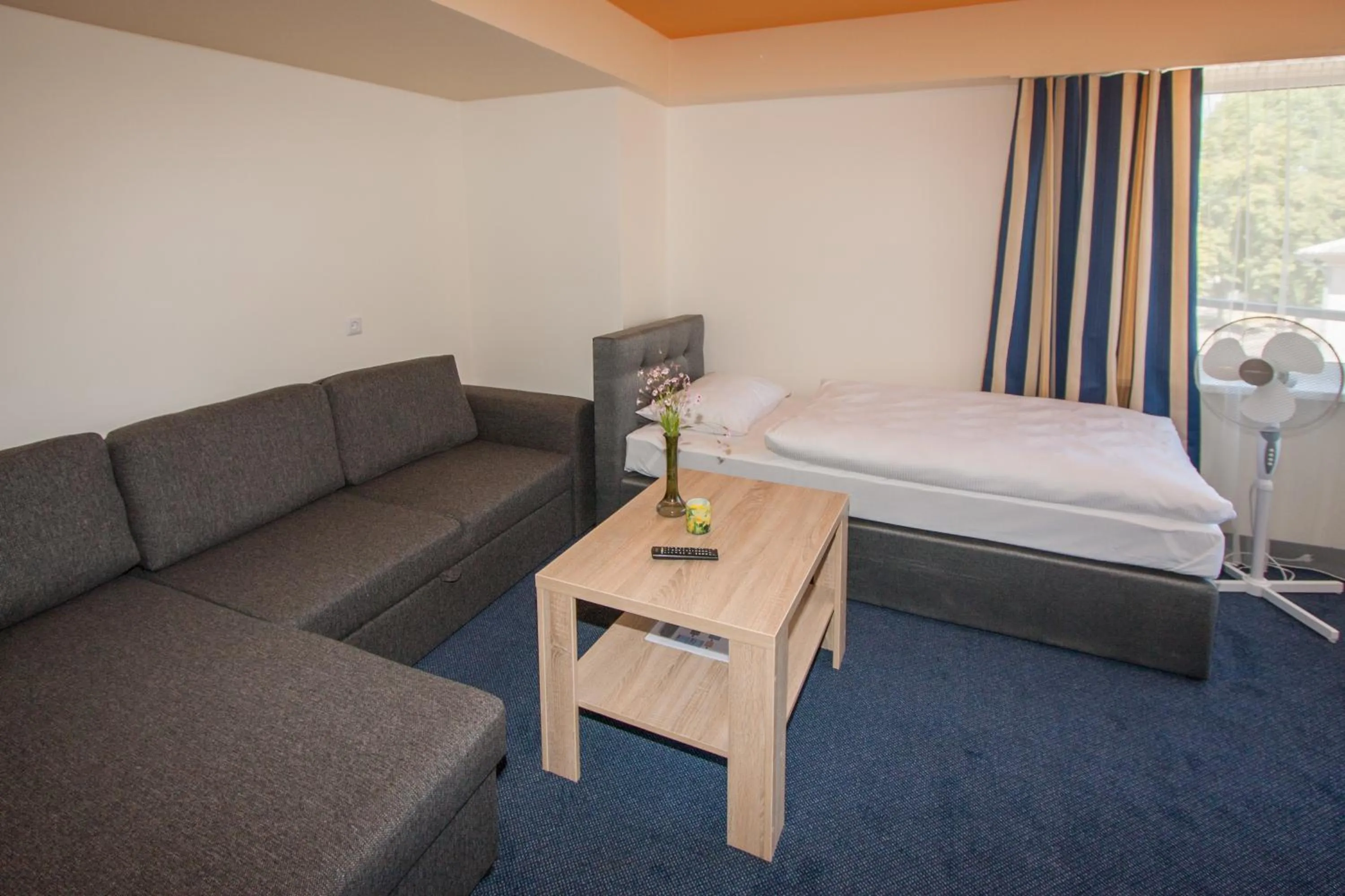 Bed in Tauras Center Hotel