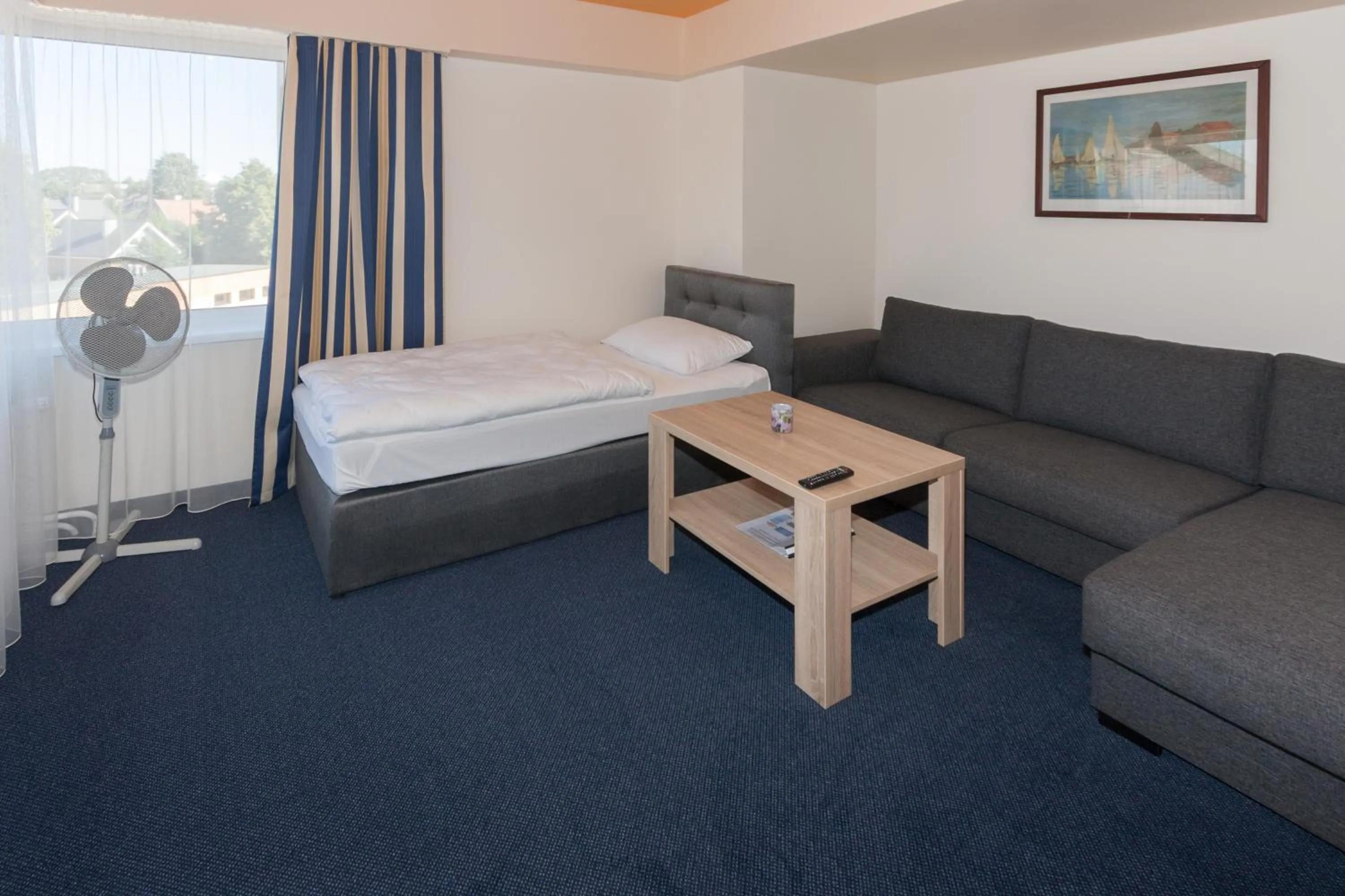 Bed in Tauras Center Hotel