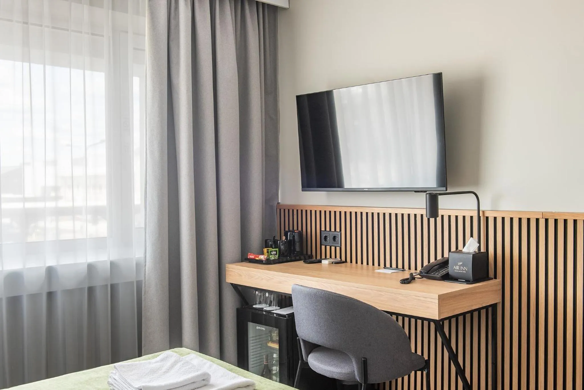 TV and multimedia in AIRINN Vilnius Airport Hotel RENOVATED 2025