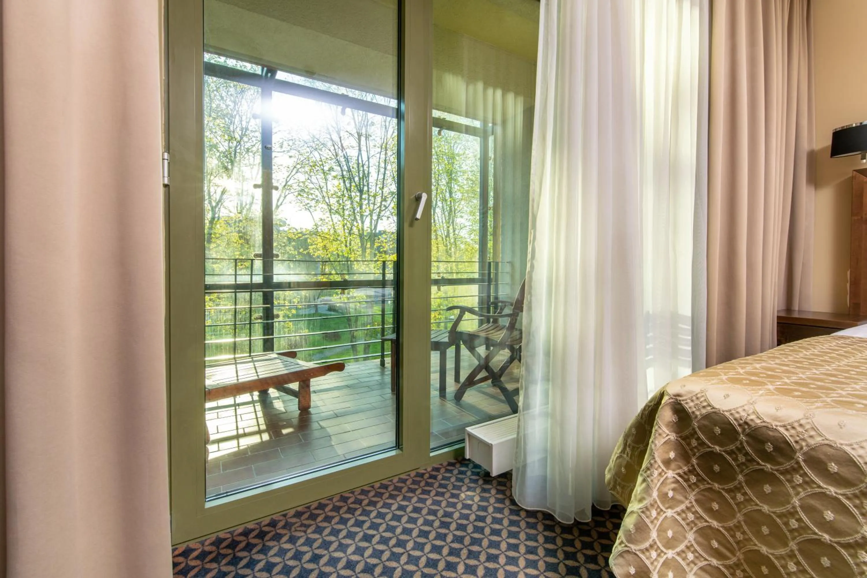 Balcony/Terrace, Bed in Grand SPA Lietuva Hotel Druskininkai