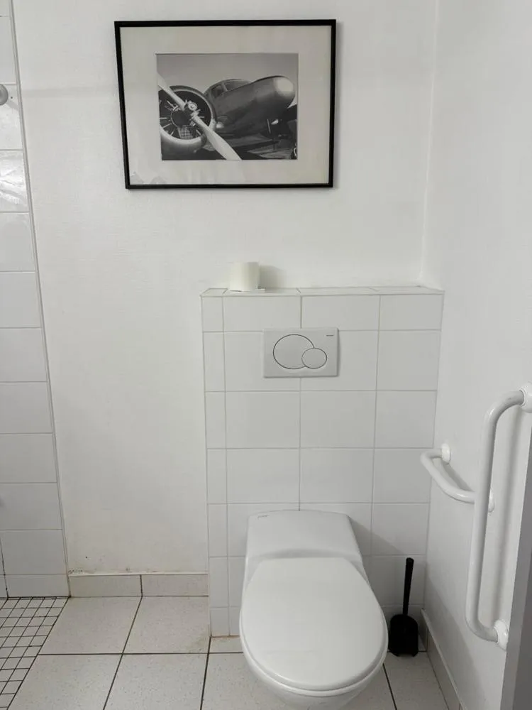 Bathroom in Brit Hotel Besancon l'Horloge