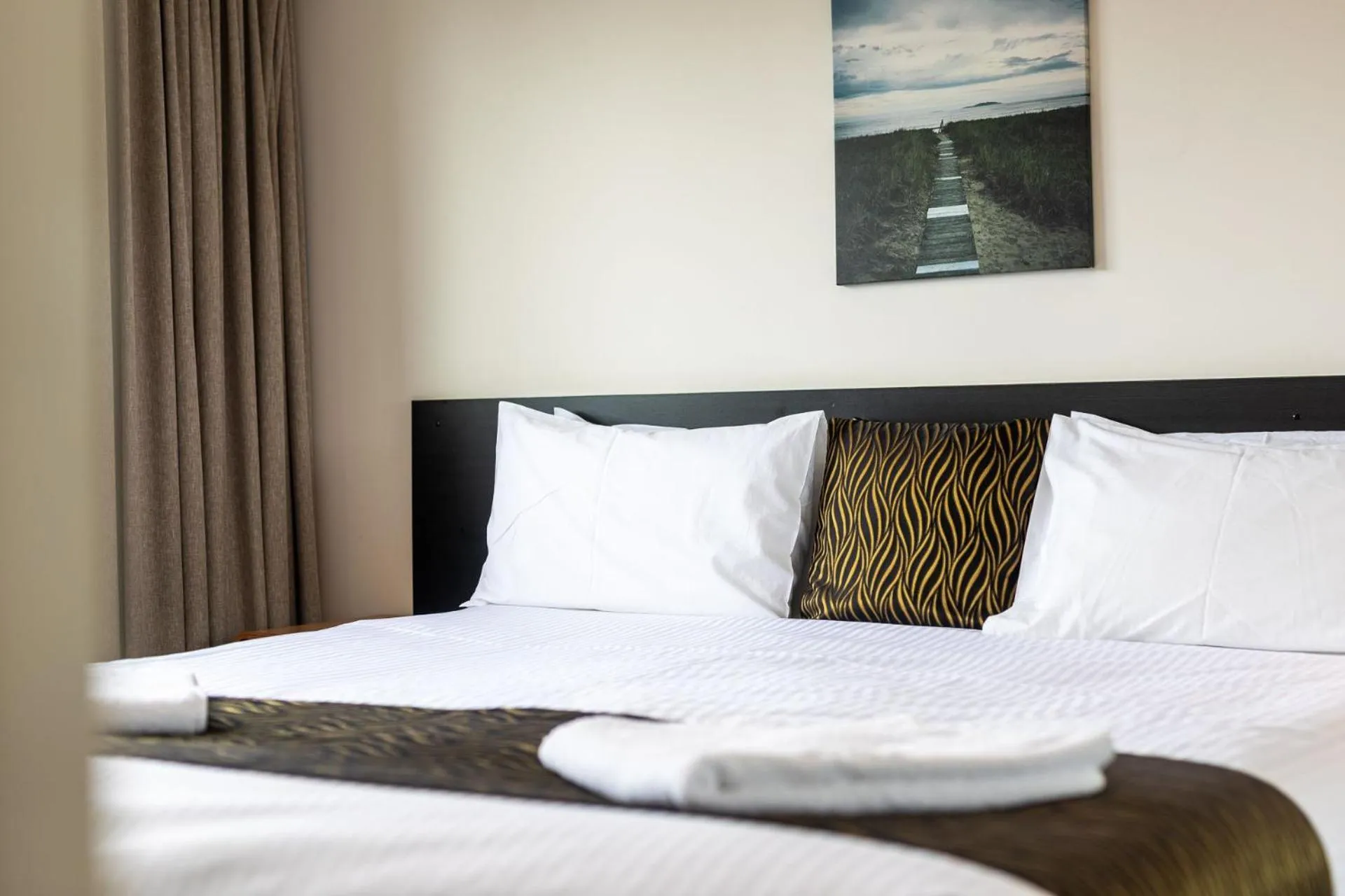 Bed in Horizon Holiday Apartments