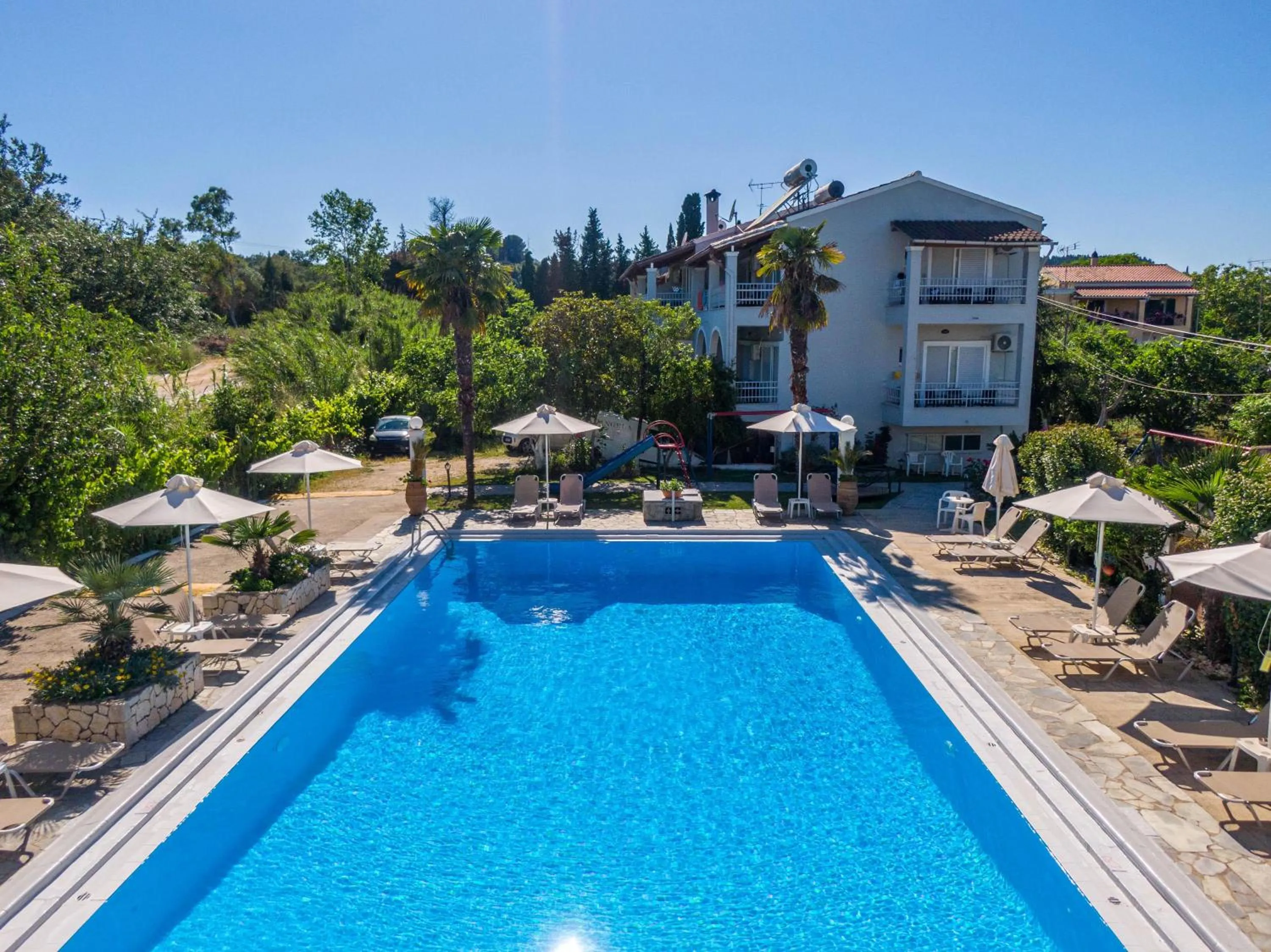 Swimming pool in Angela Hotel & Apartments
