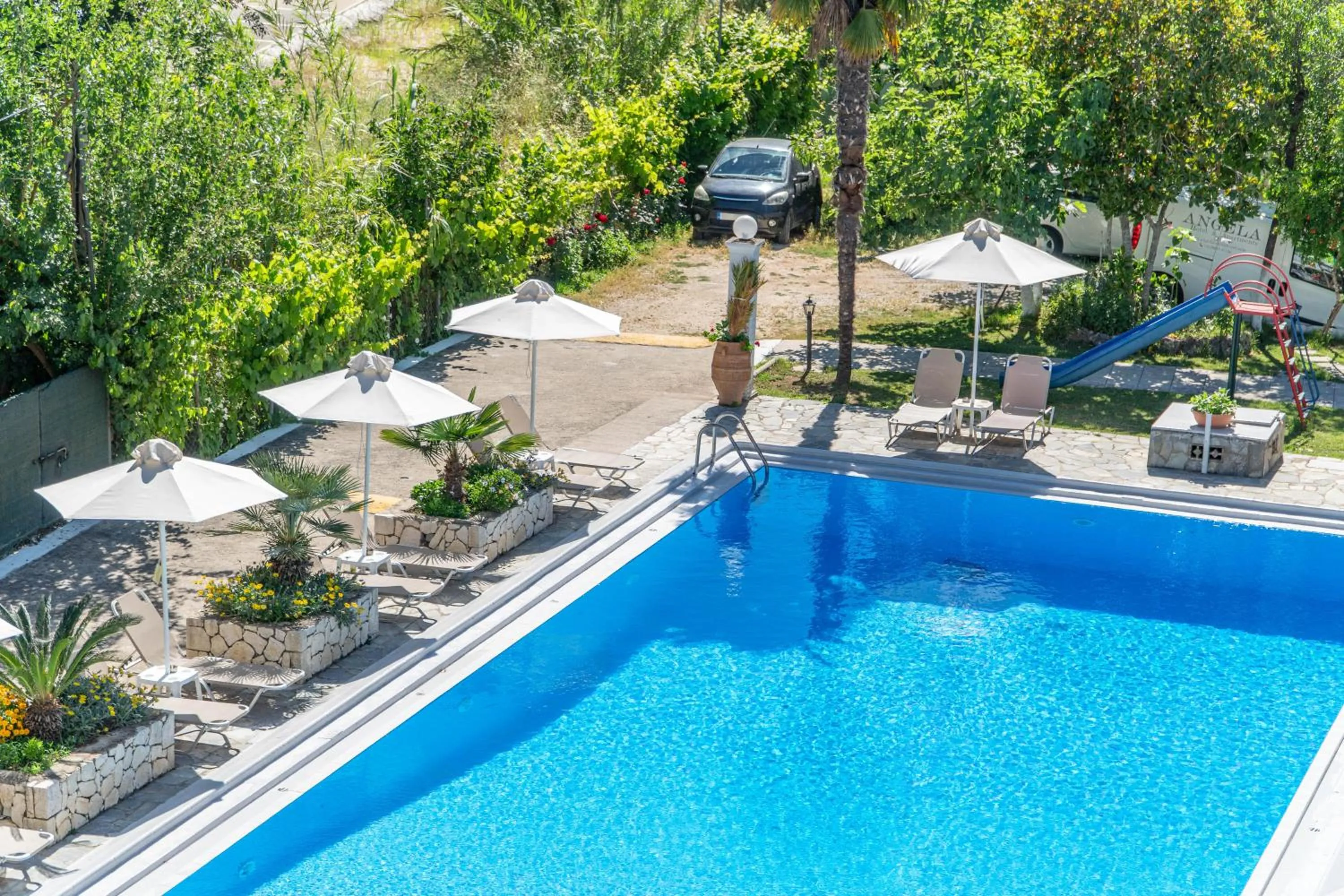 Swimming pool in Angela Hotel & Apartments