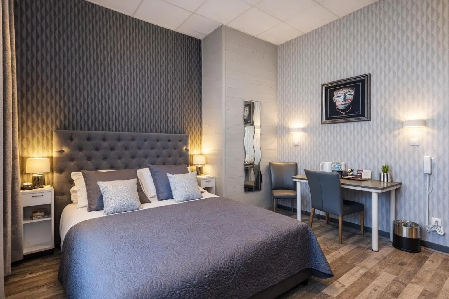 Bed in Hôtel de Charme Le Provence