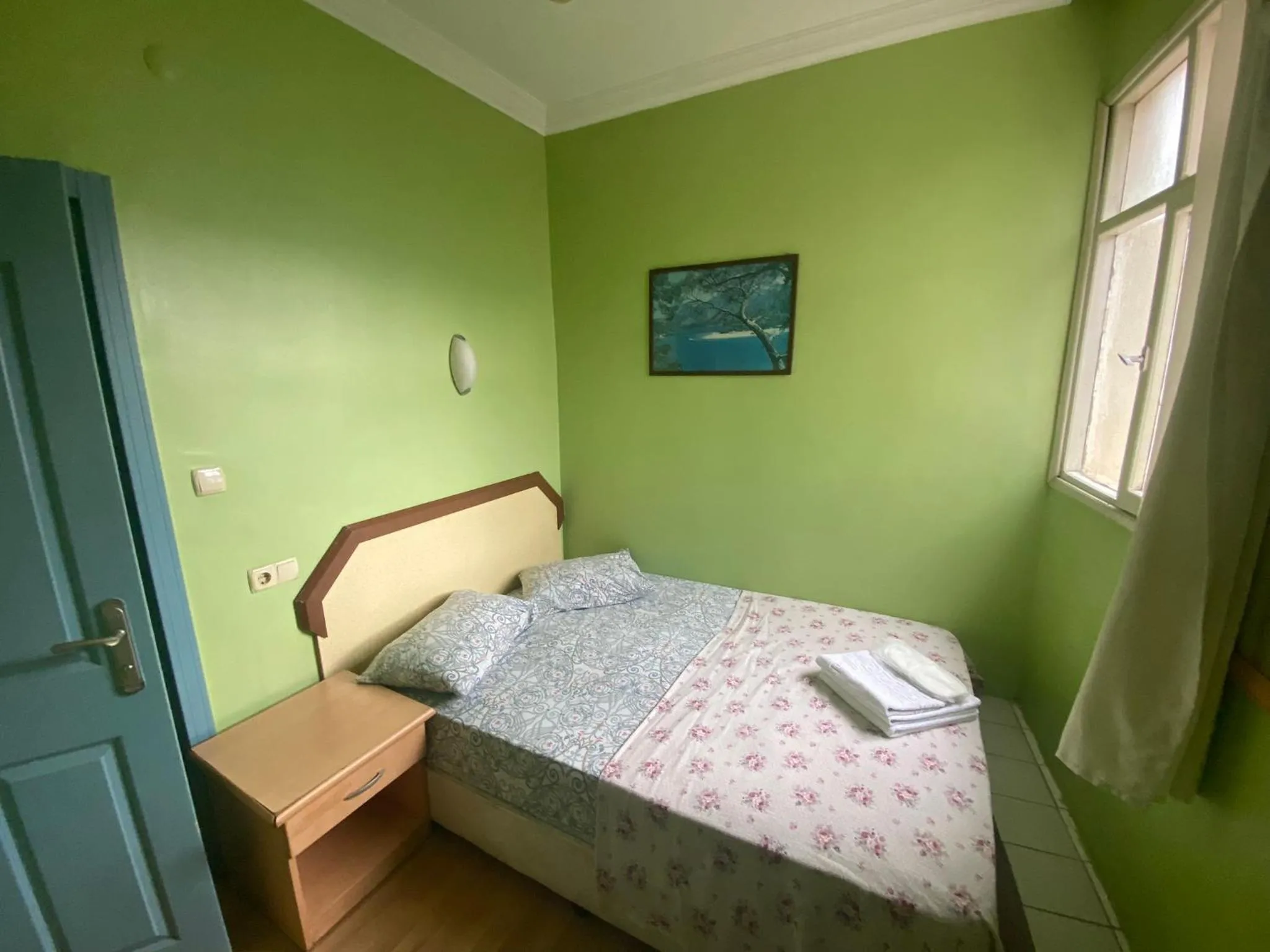 Bed in Camel Hotel & Apart