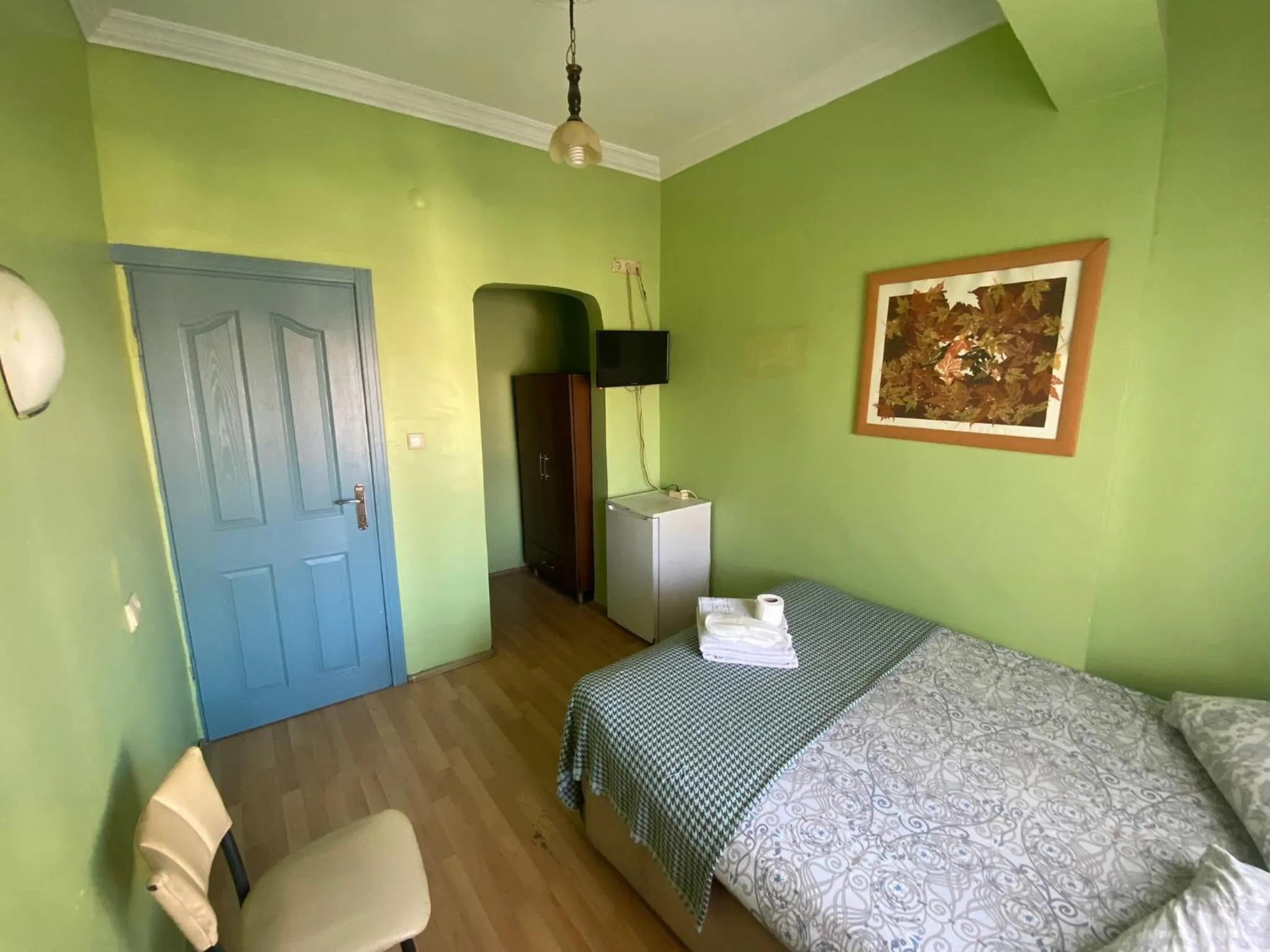 Bed in Camel Hotel & Apart