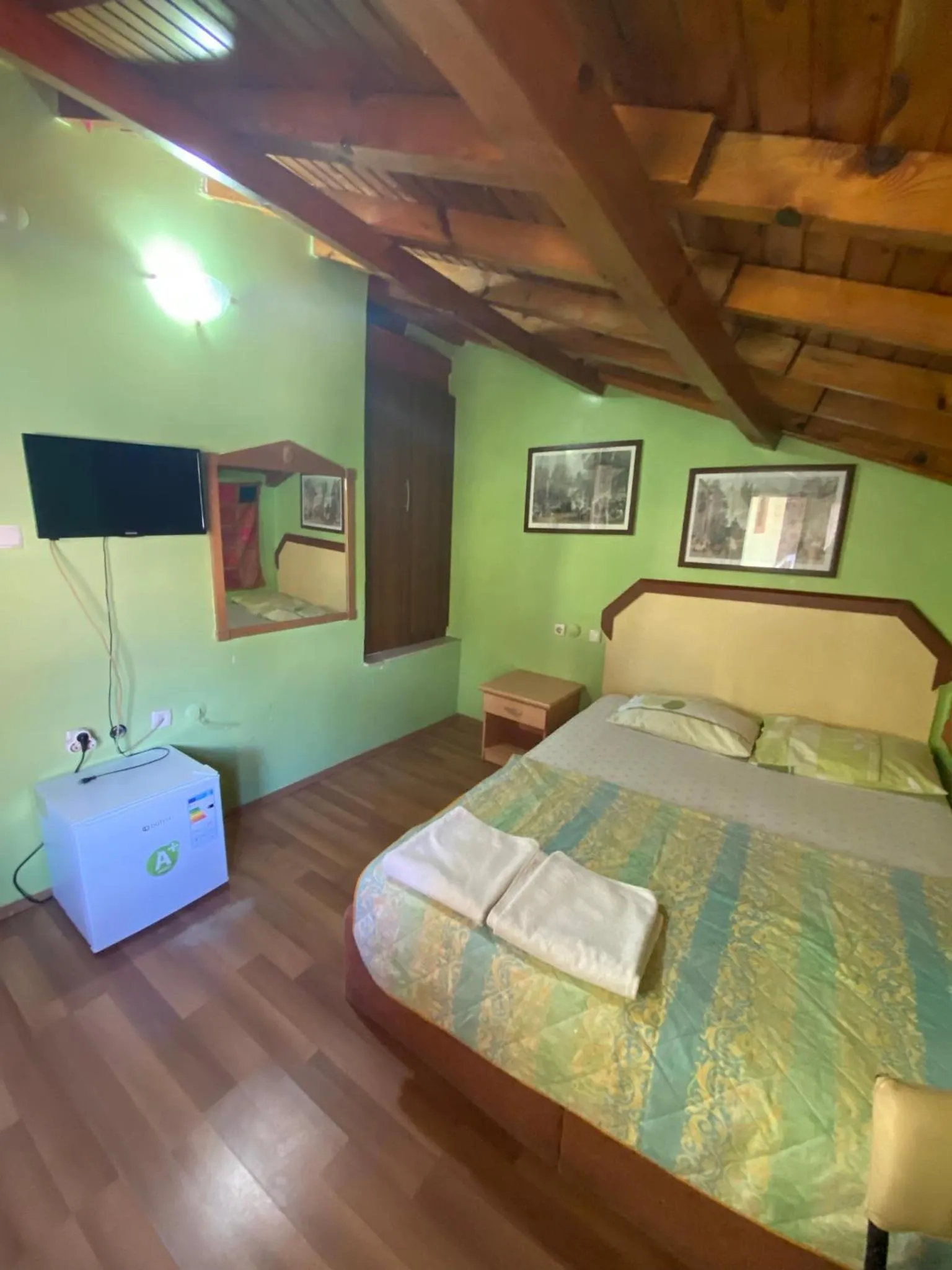 Bed in Camel Hotel & Apart