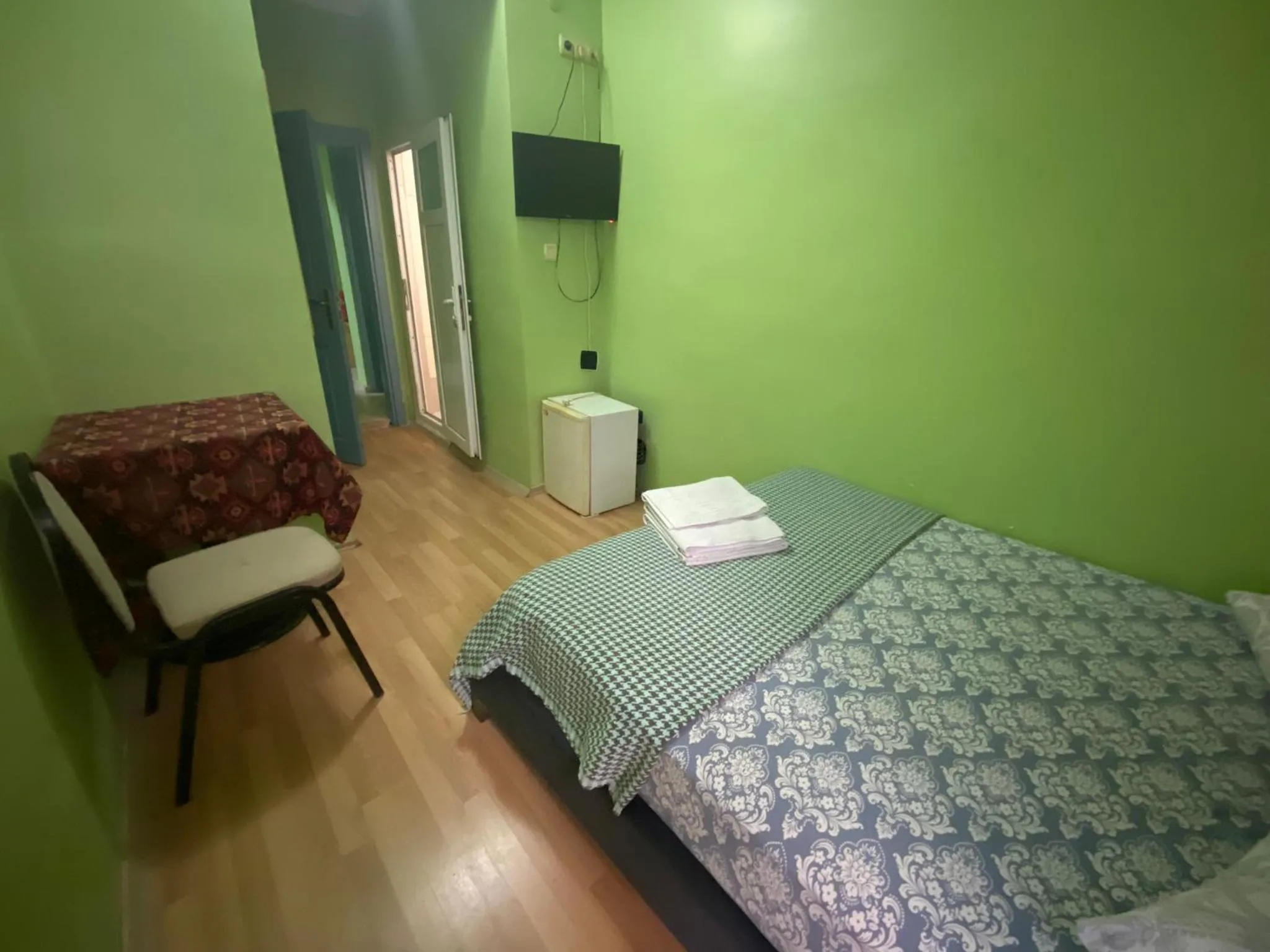 Bed in Camel Hotel & Apart