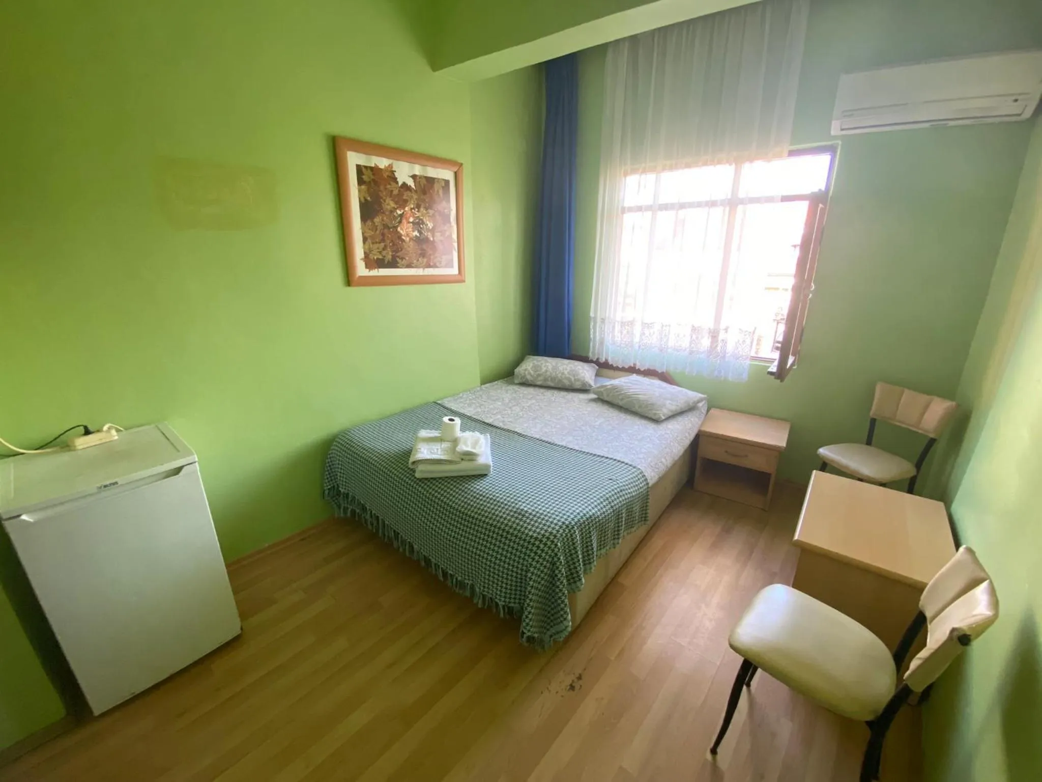 Bed in Camel Hotel & Apart