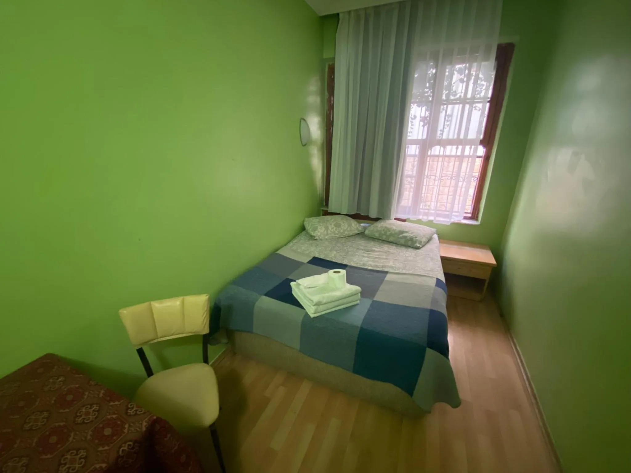 Bed in Camel Hotel & Apart