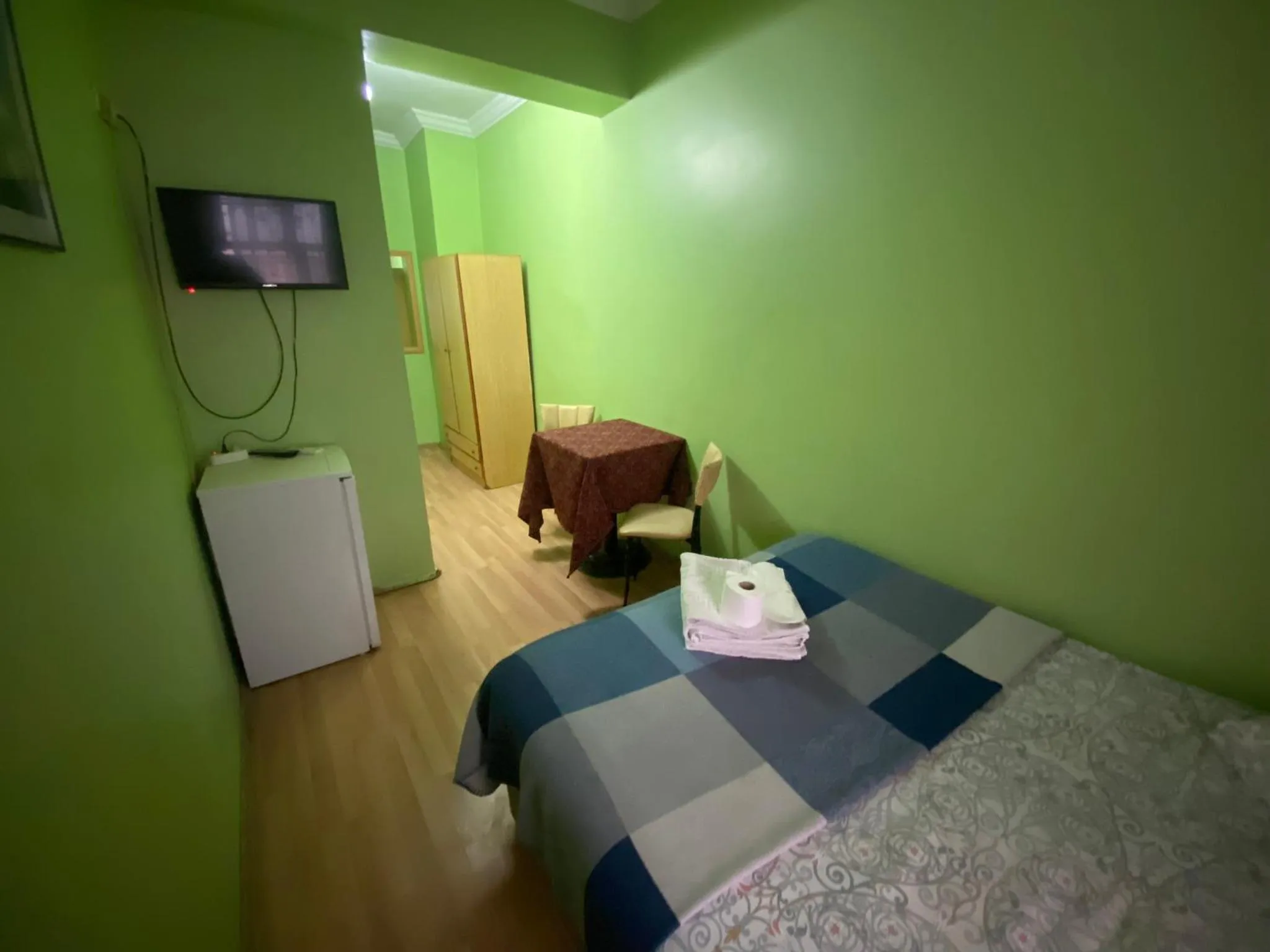 Bed in Camel Hotel & Apart