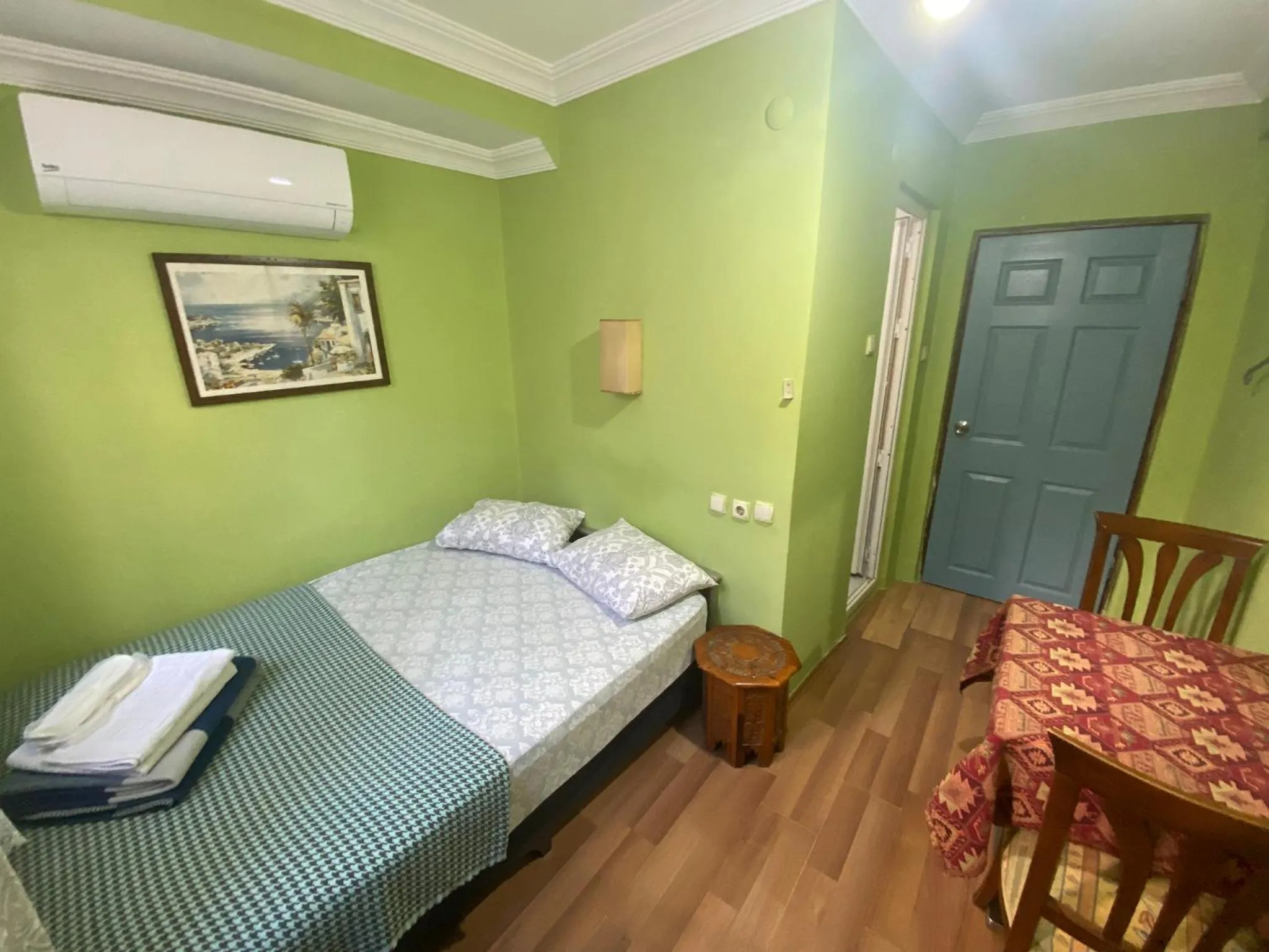 Bed in Camel Hotel & Apart