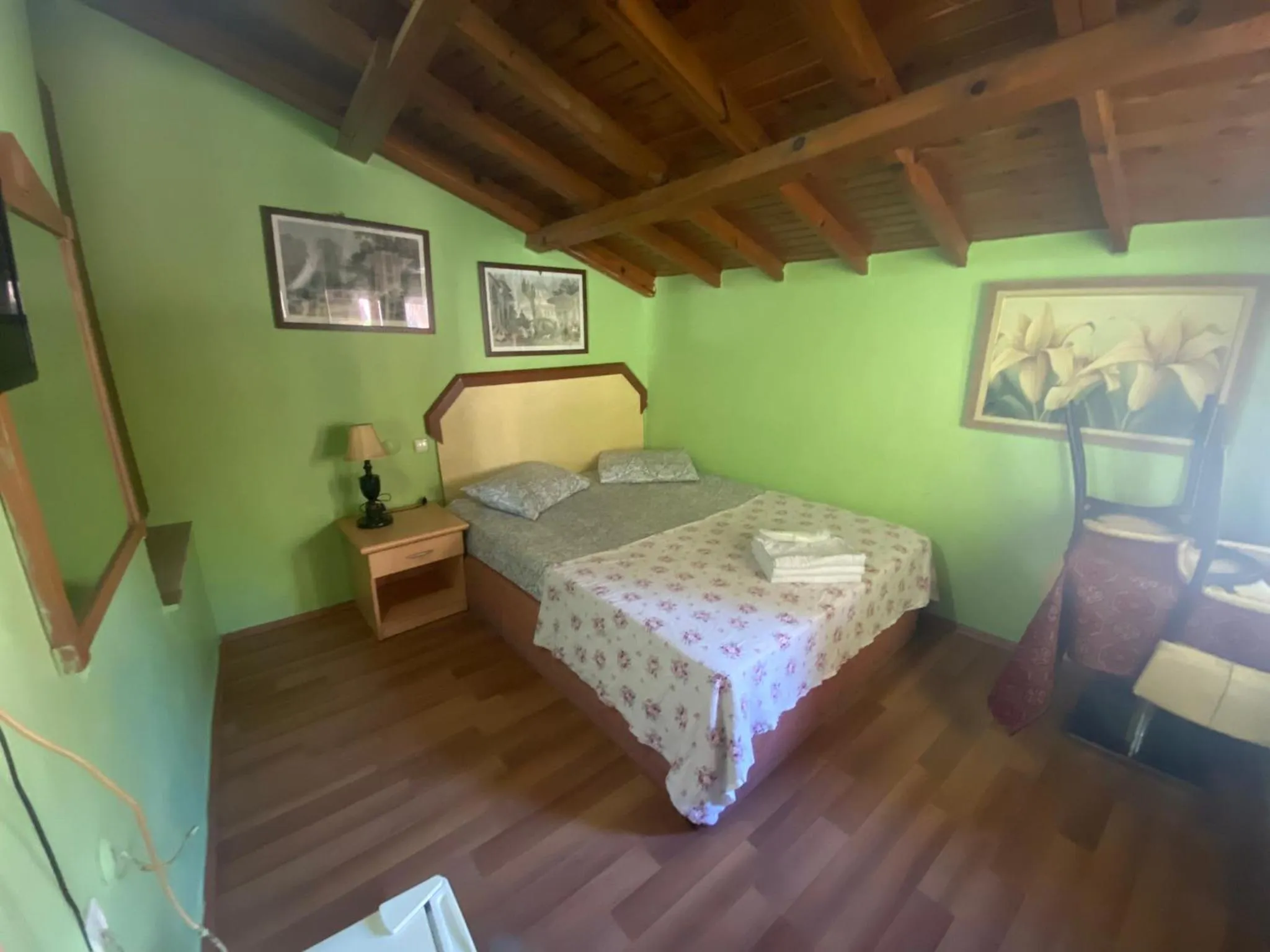 Bed in Camel Hotel & Apart