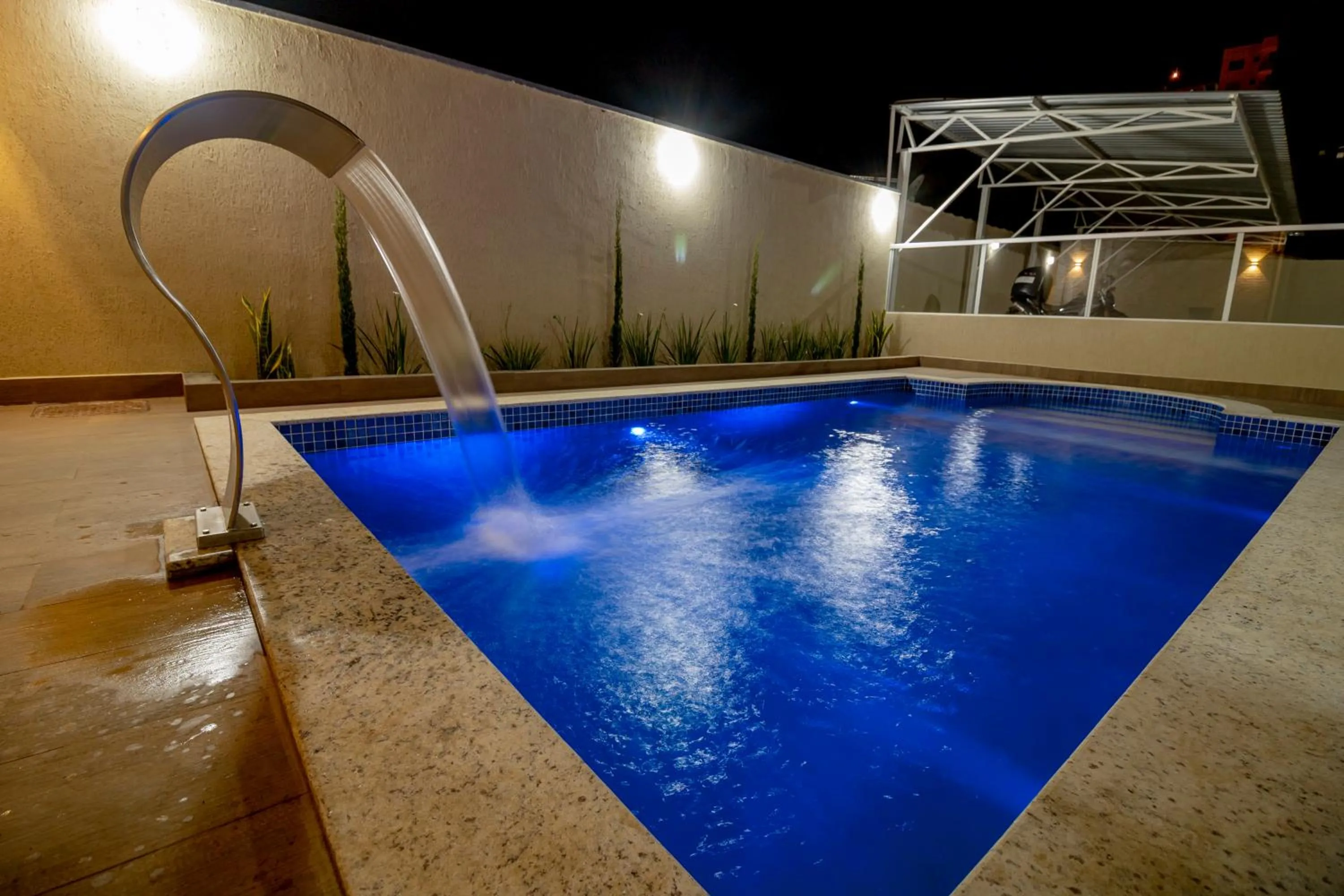 Swimming pool in Pousada Recanto das Caldas