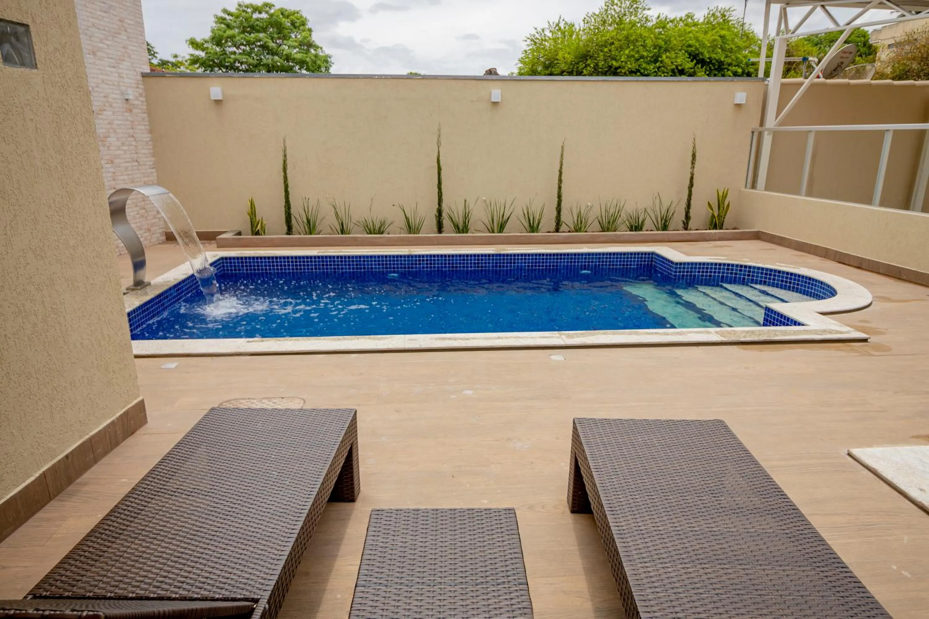 Swimming pool in Pousada Recanto das Caldas