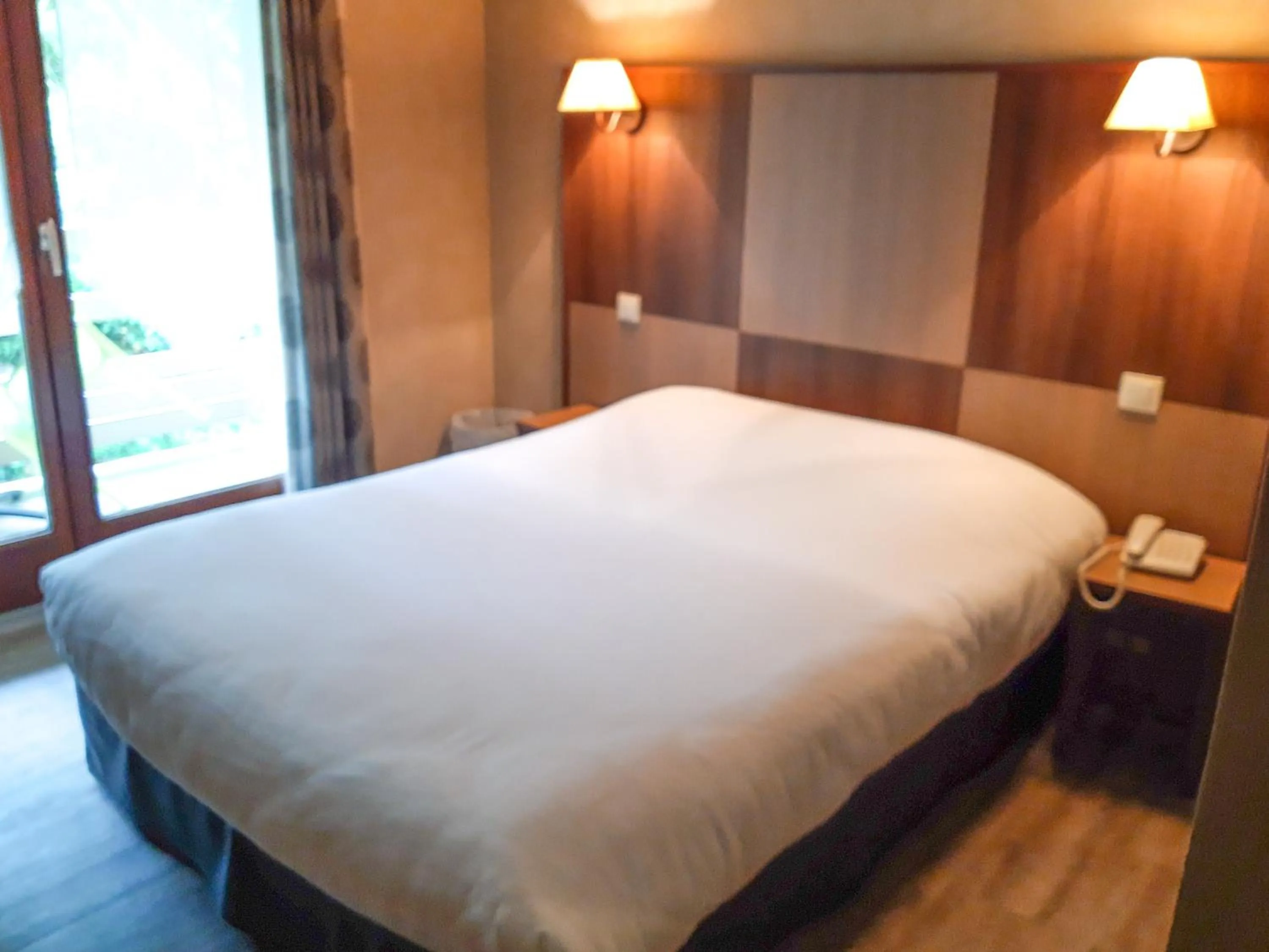 Bed in Hotel Alicia Auray Le Bono
