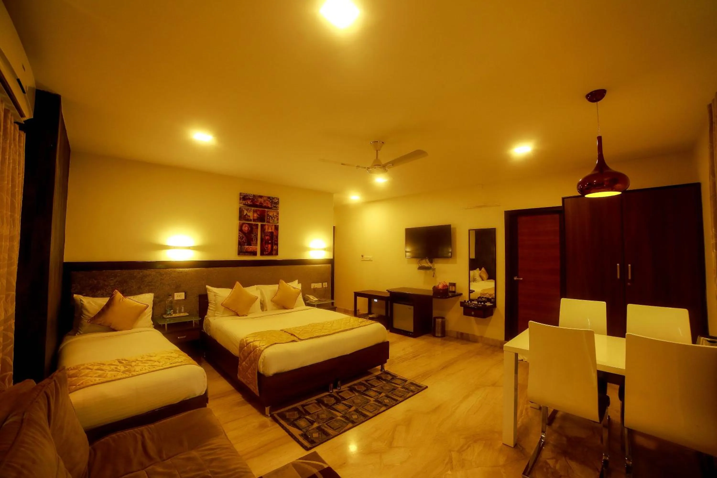 Living room, Bed in D Breeze Suites