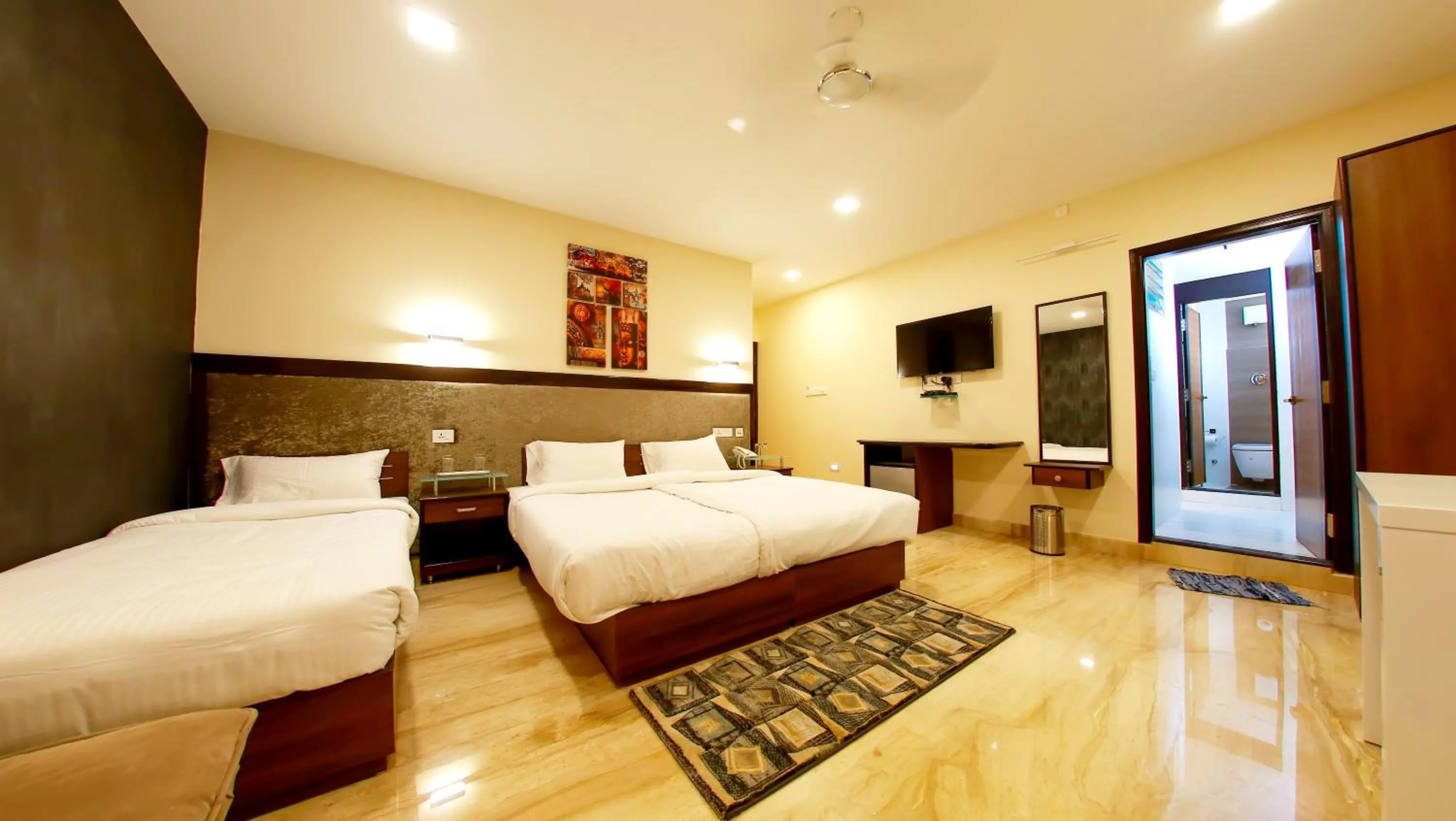 Bed in D Breeze Suites