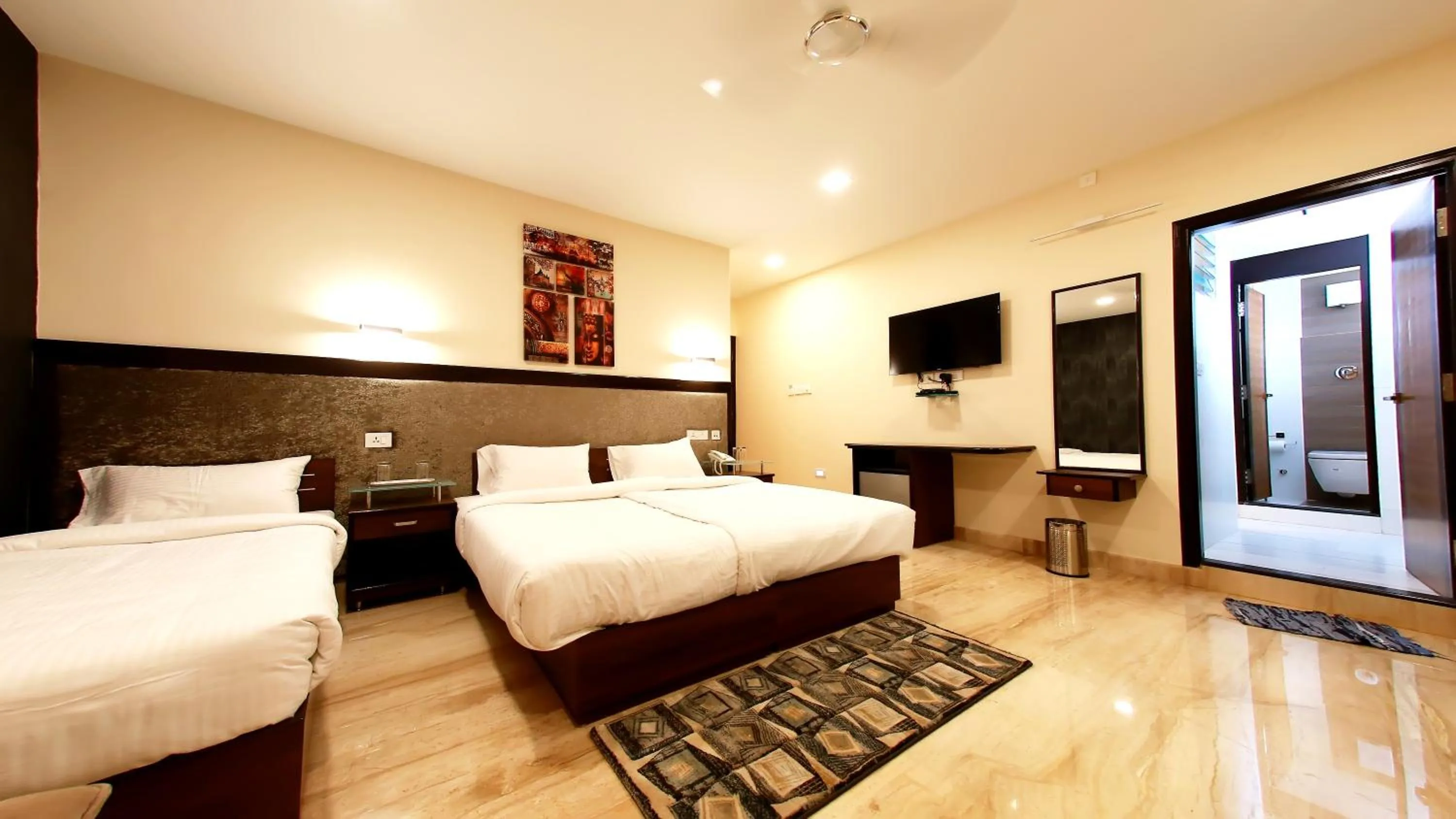 Bed in D Breeze Suites