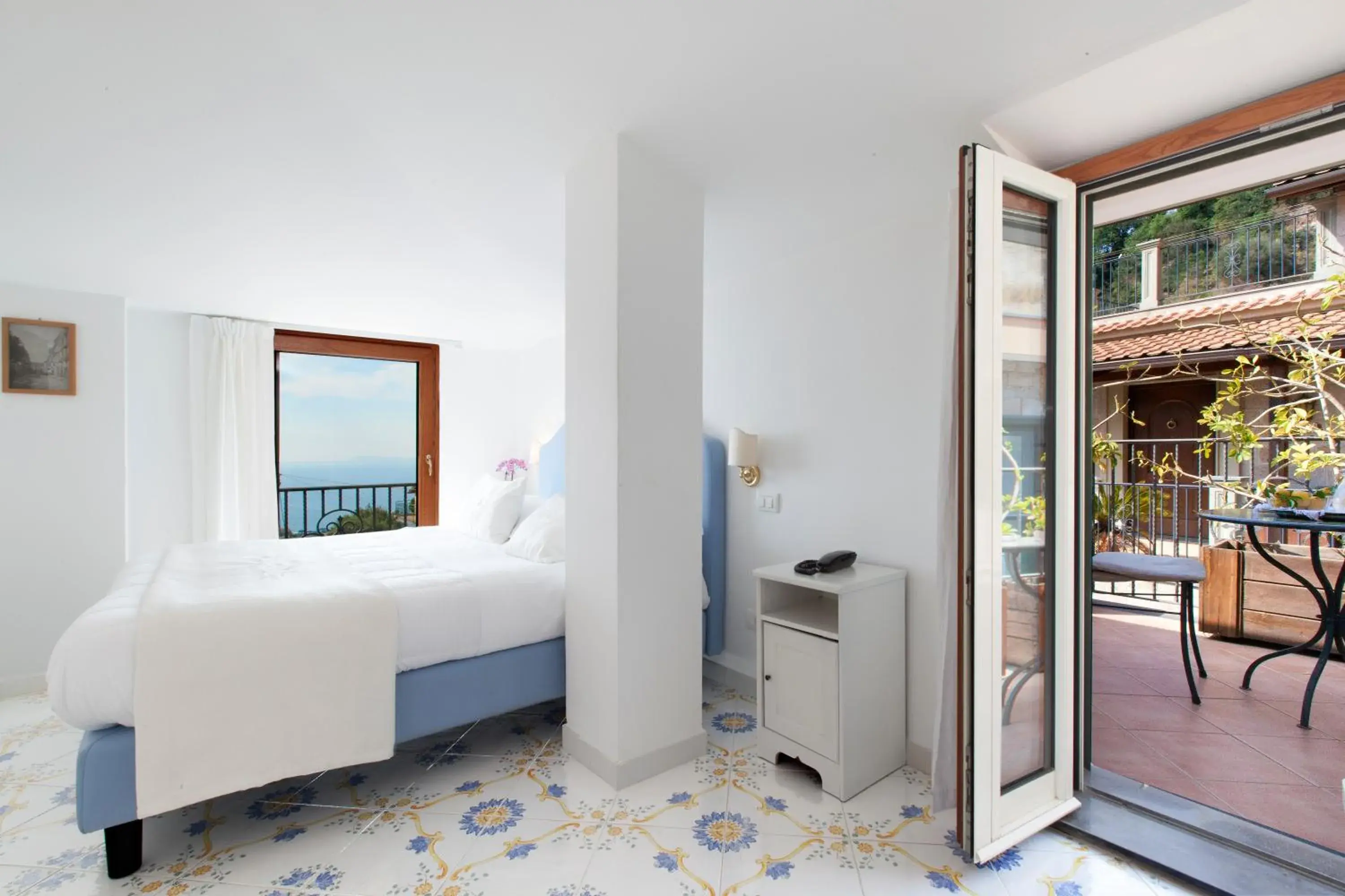 Patio, Bed in Villa Pane Resort Patio, Bed in Villa Pane Resort