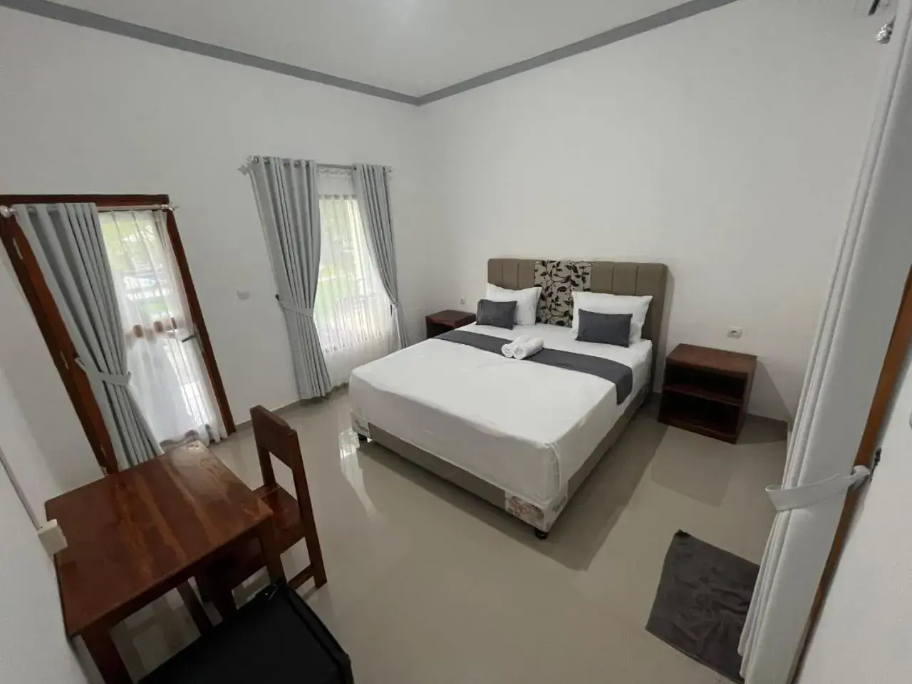 Deluxe Double Room in Kuta Lodge Homestay Deluxe Double Room in Kuta Lodge Homestay