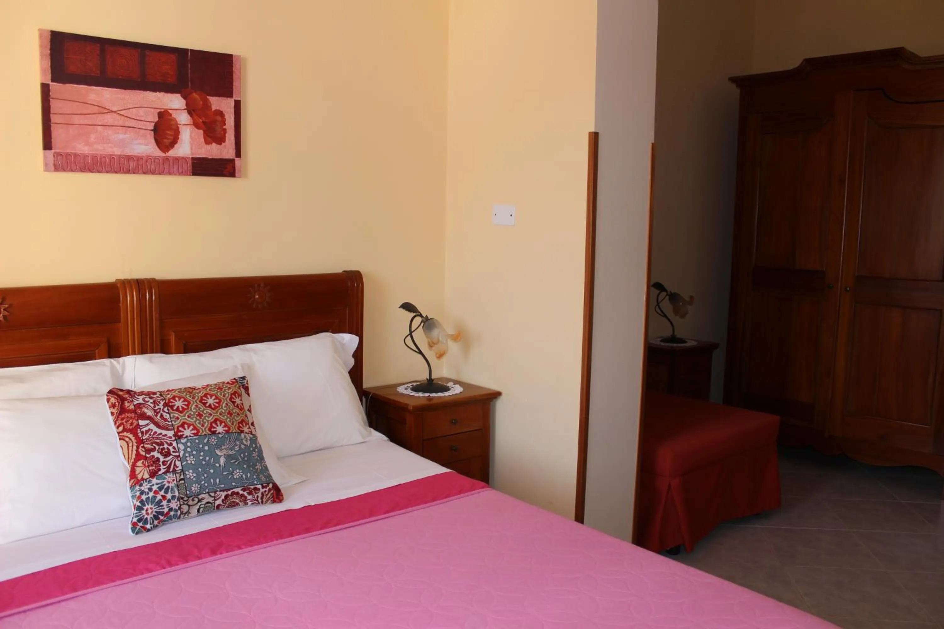 Bed in Raggio di Sole Bed & Breakfast