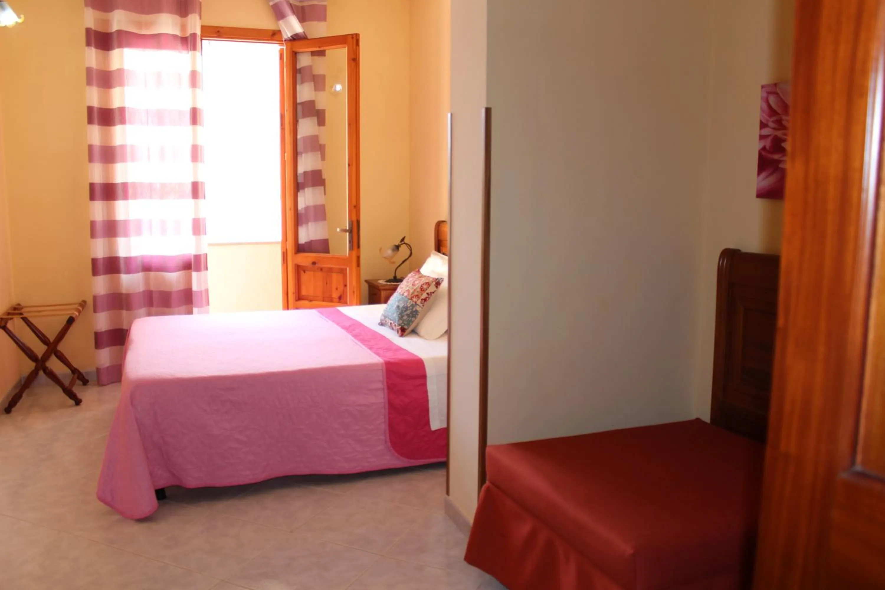 Bed in Raggio di Sole Bed & Breakfast