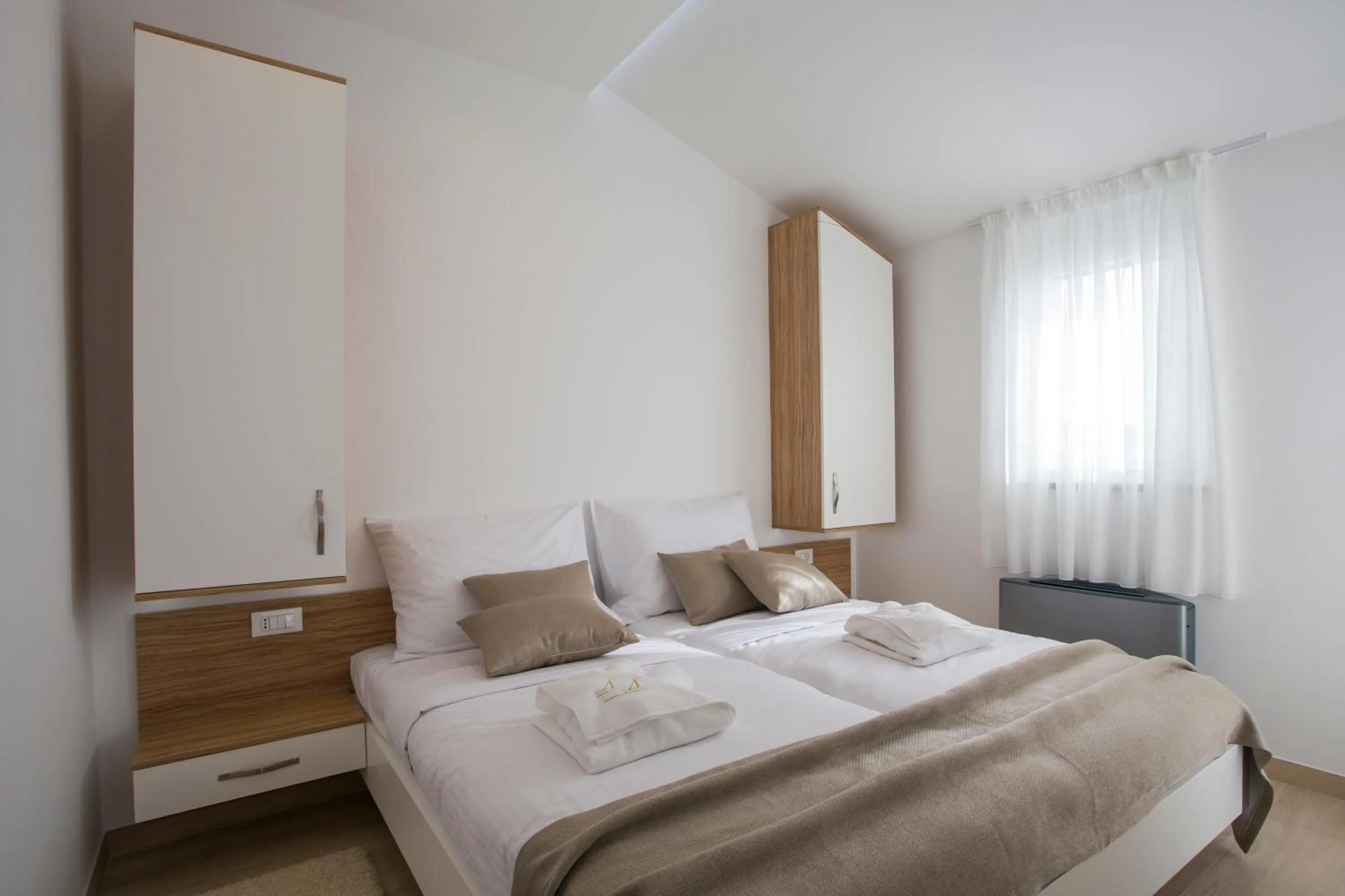 Bed in Adrion Aparthotel