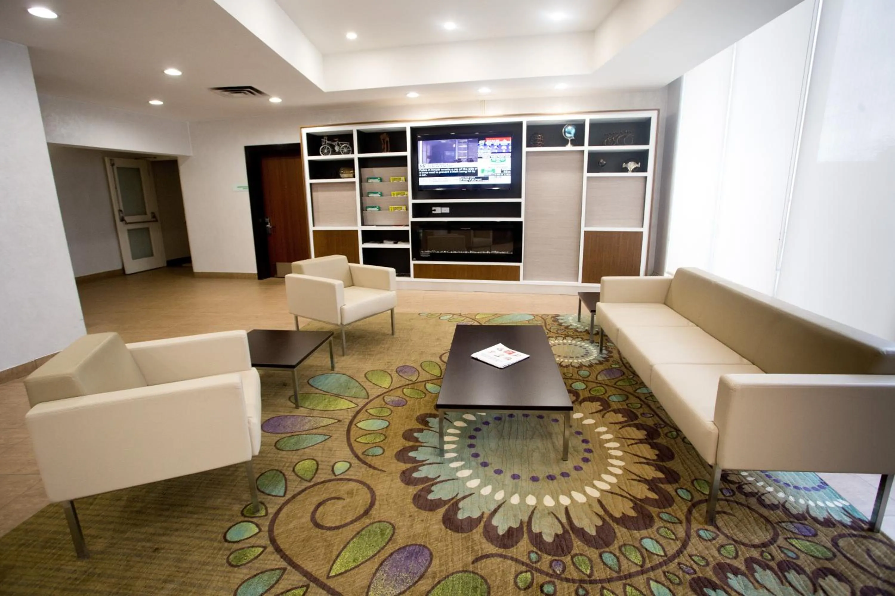 Lobby or reception in Holiday Inn Hotel Peterborough Waterfront by IHG