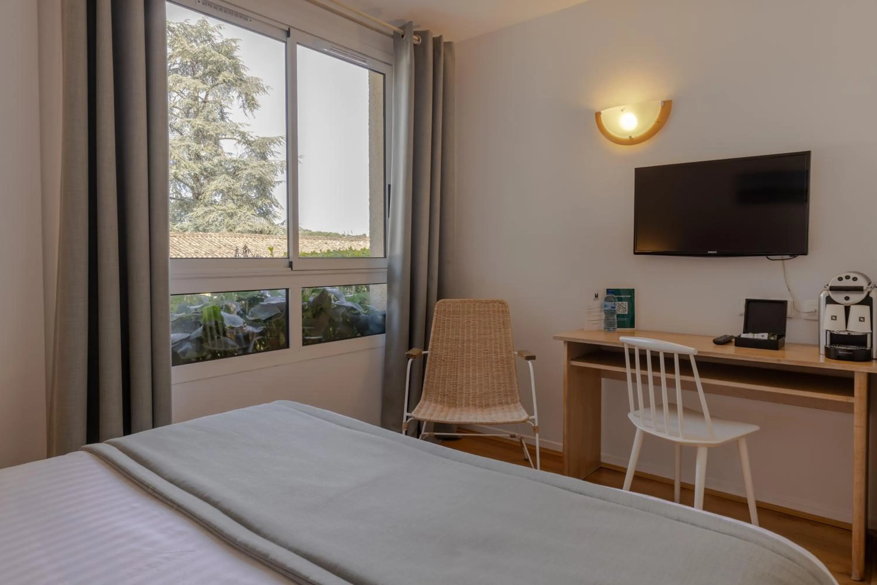 Photo of the whole room, Bed in Pey La Tour - Logis Hôtels & Restaurant