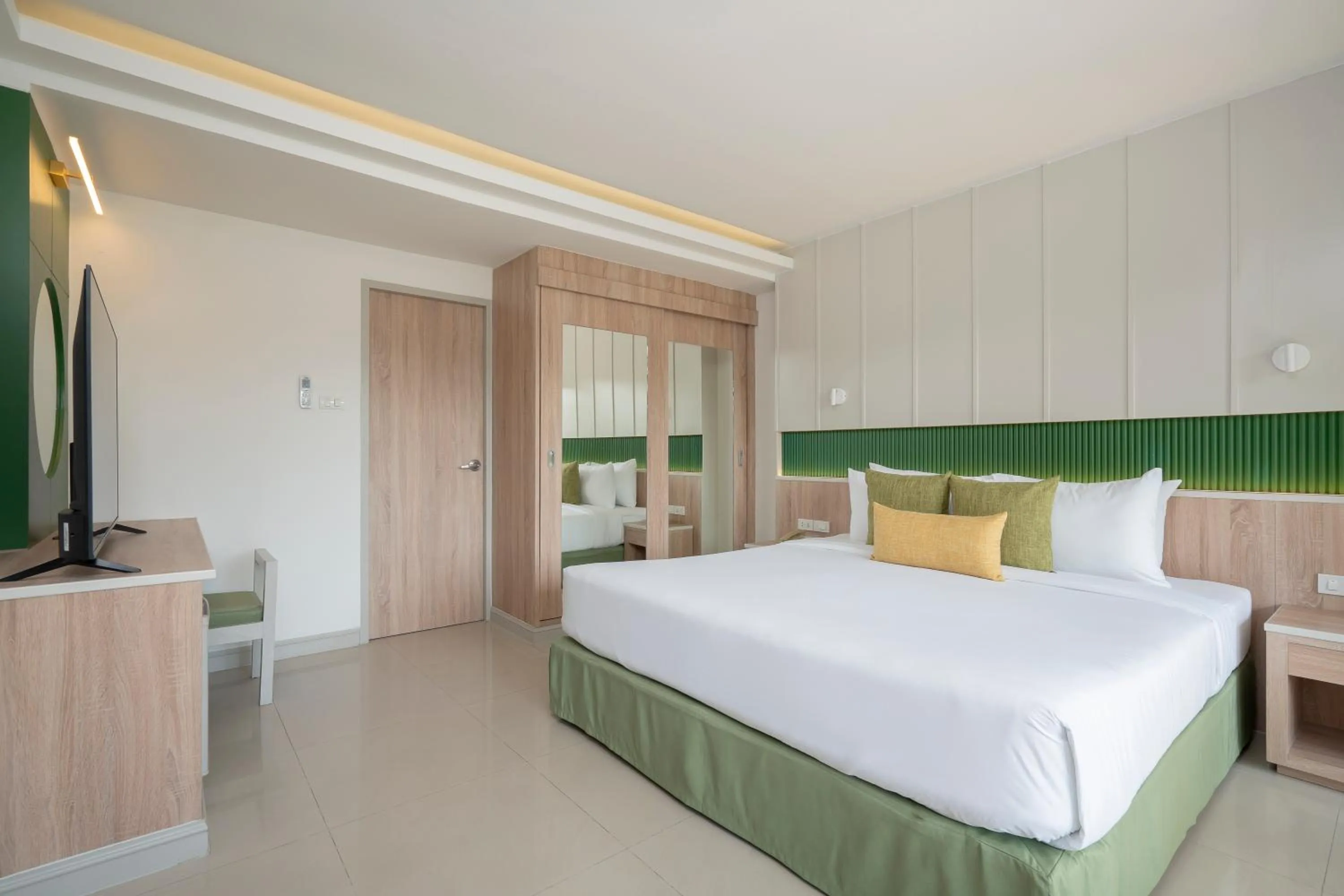 Bed in The Green Park Resort