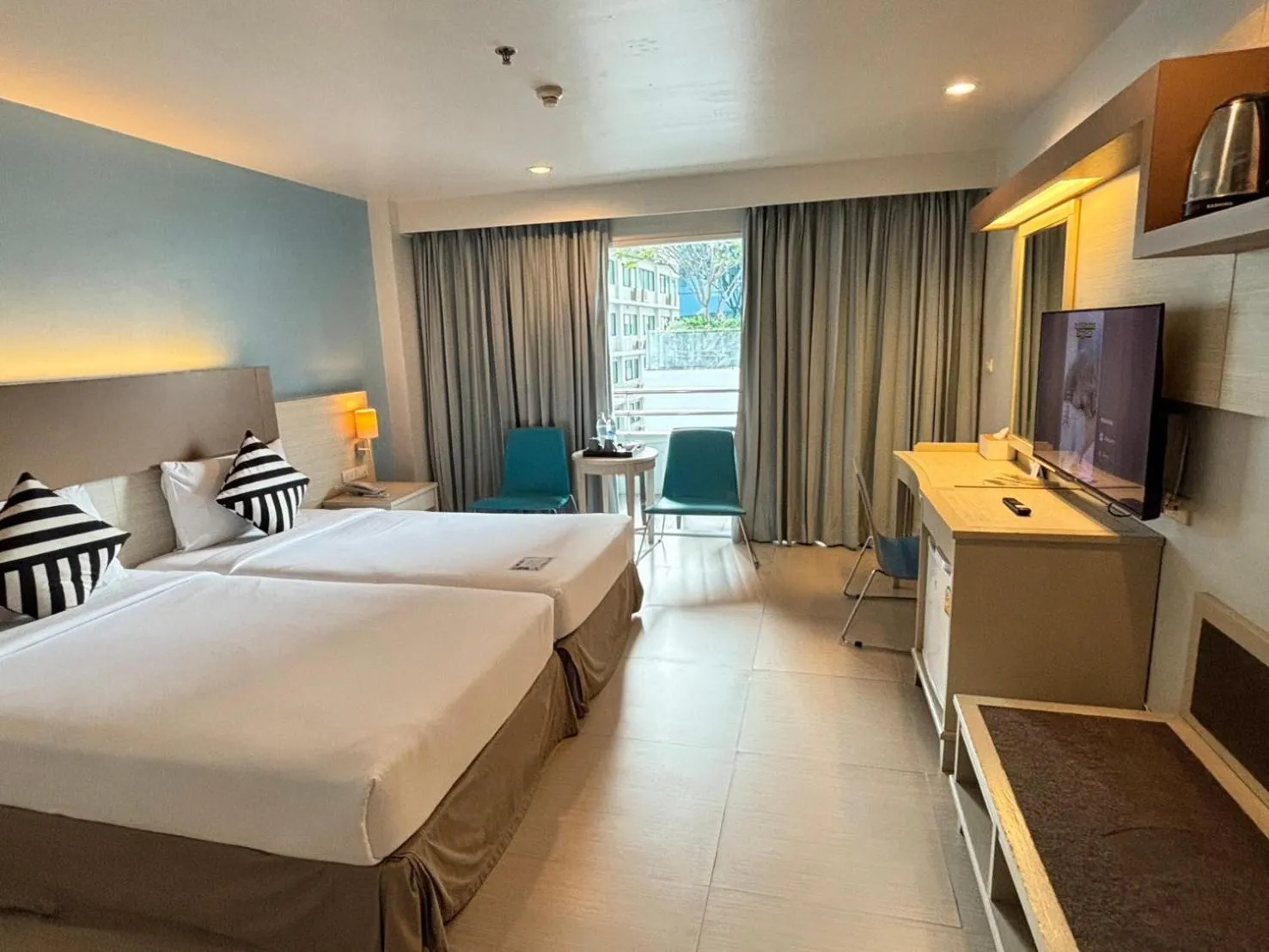 Bedroom, Bed in Sunshine Vista Hotel