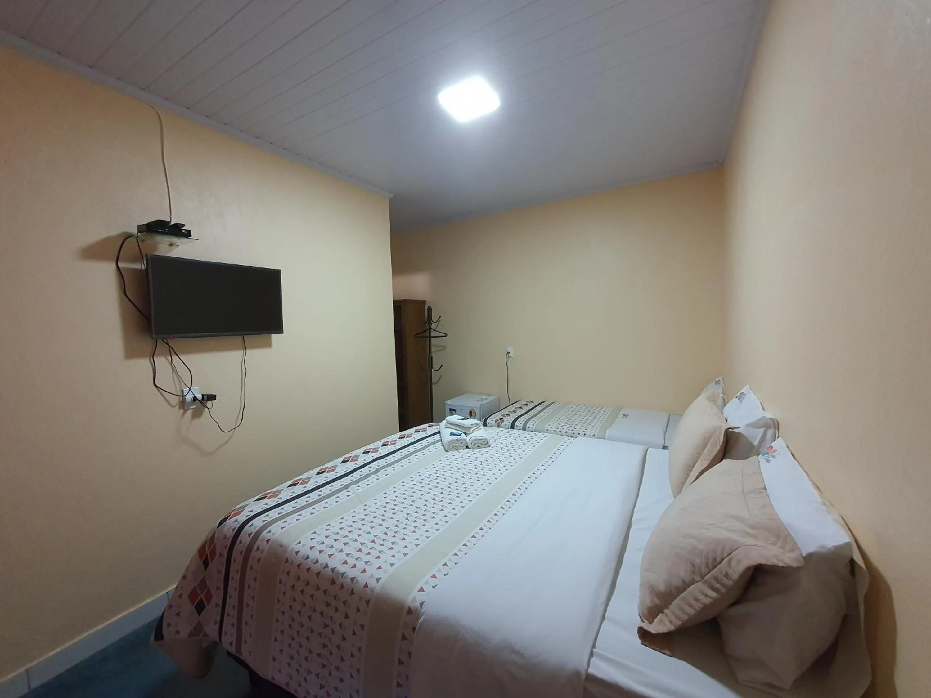 Photo of the whole room, Bed in Pousada Quatro Estações
