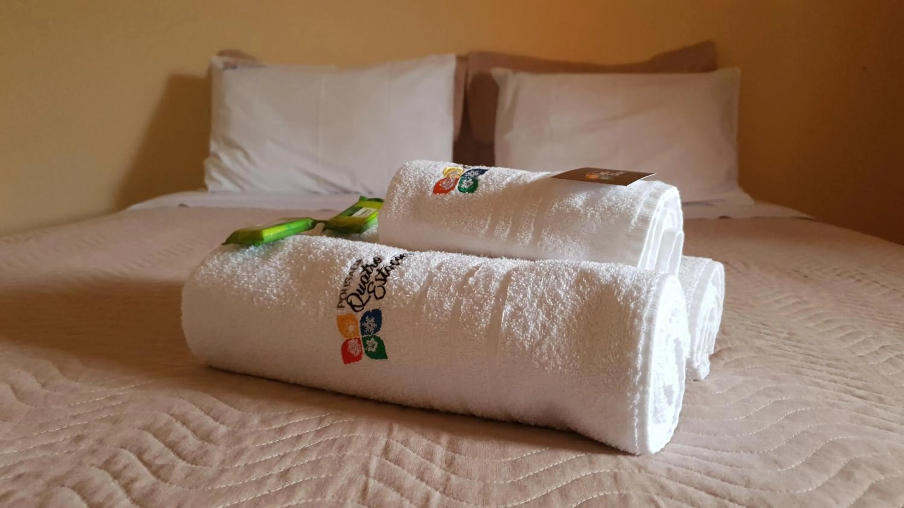 Bed in Pousada Quatro Estações