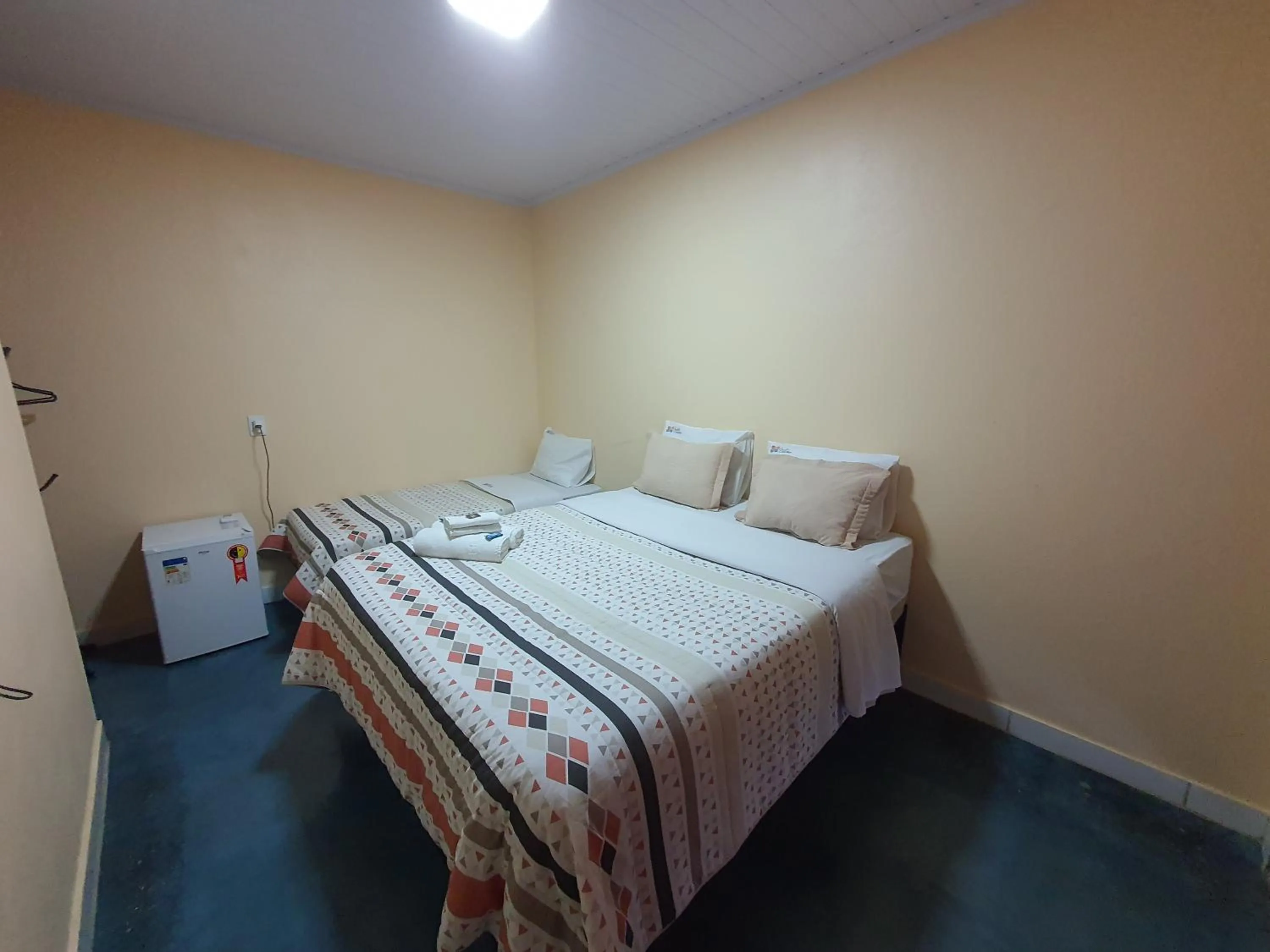 Photo of the whole room, Bed in Pousada Quatro Estações