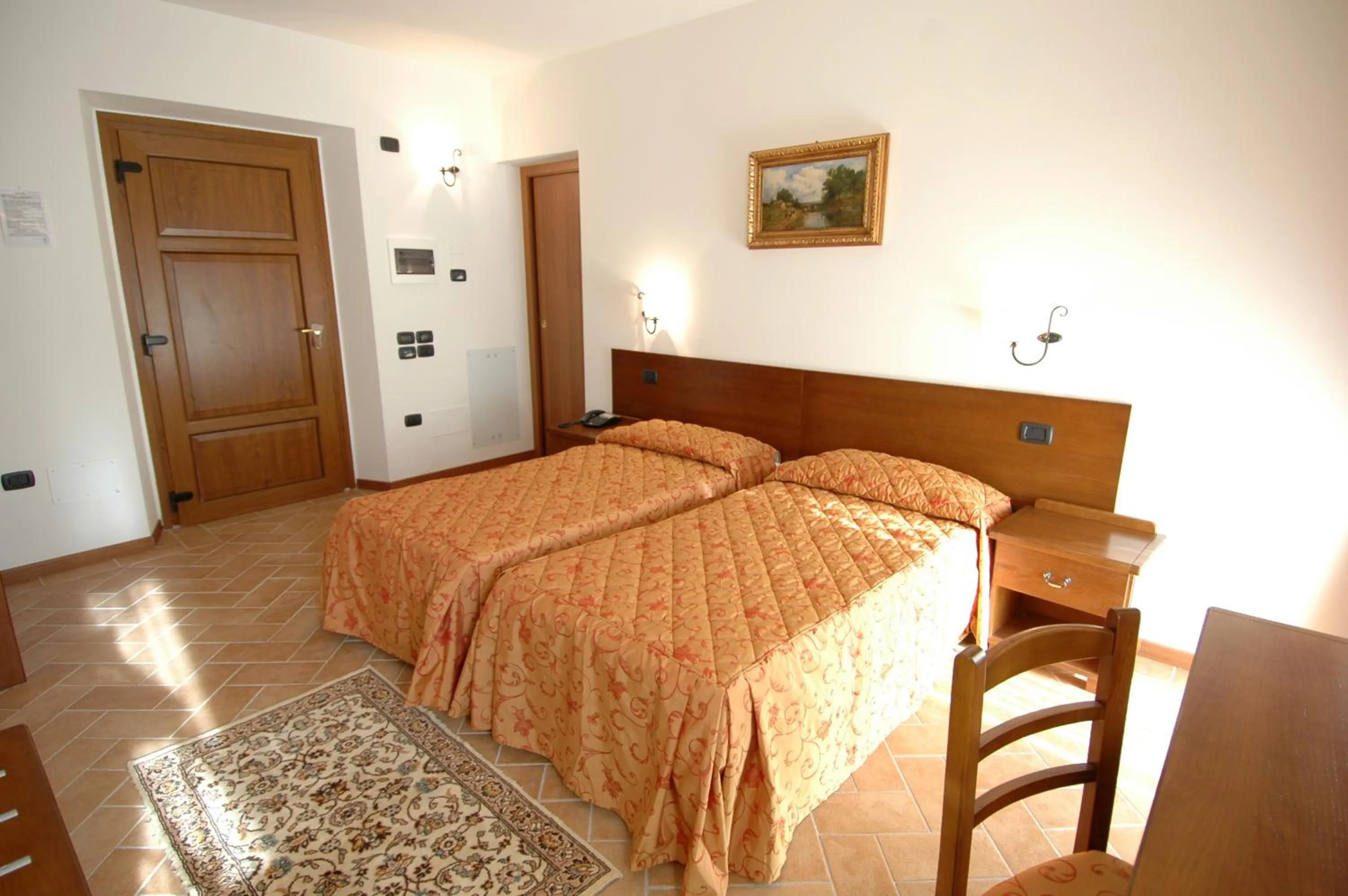 Bed in Colleverde Country House & SPA Urbino