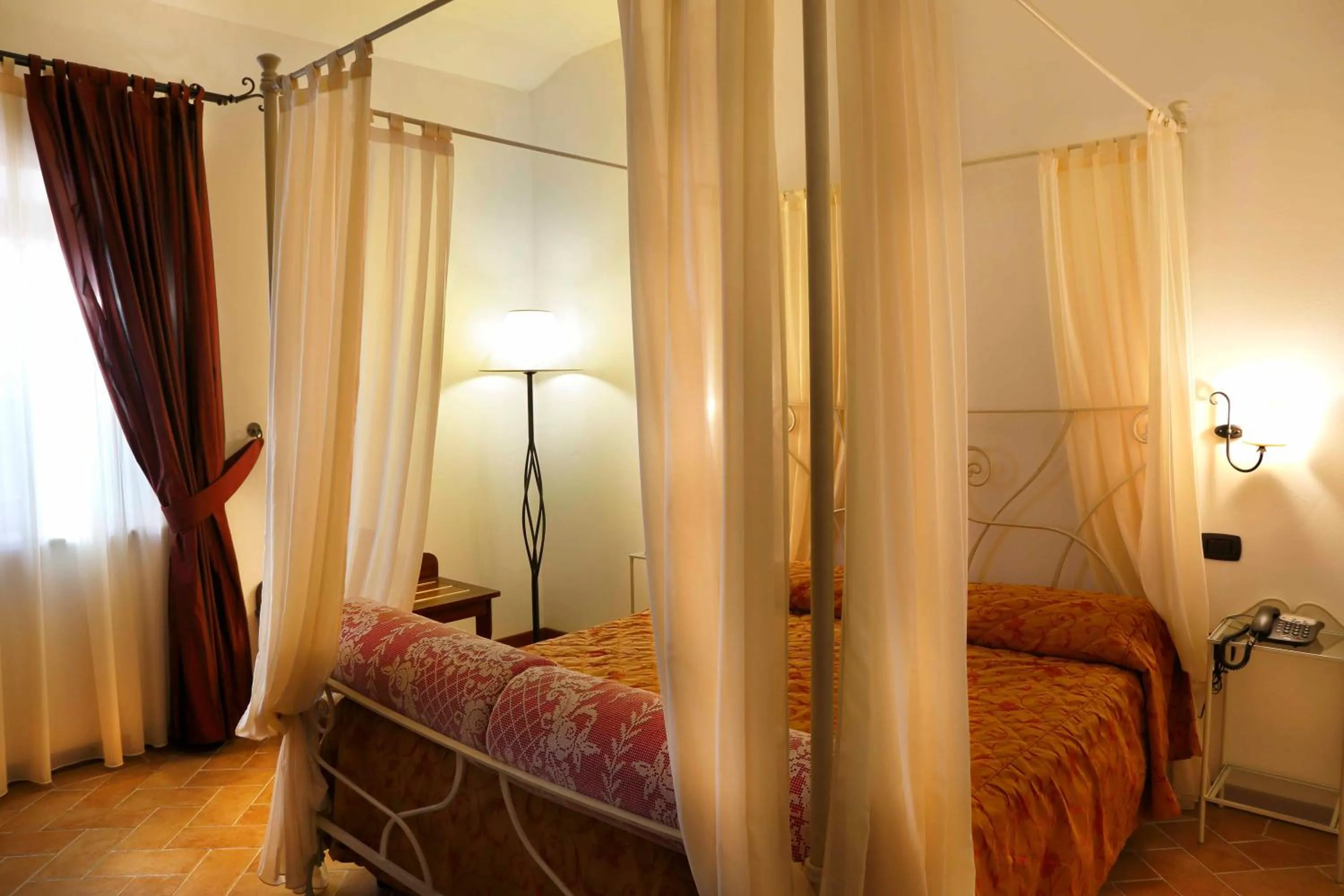 Bed in Colleverde Country House & SPA Urbino