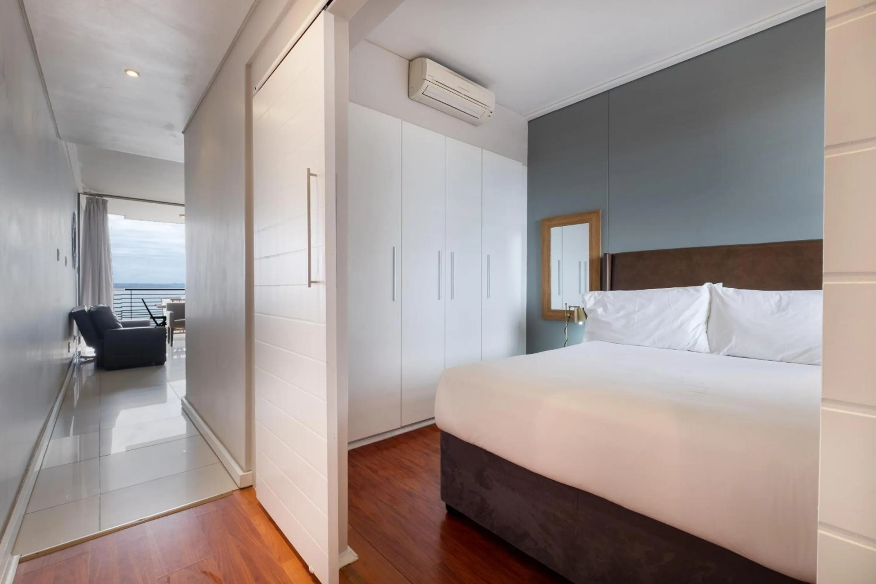 Photo of the whole room, Bed in Point Waterfront Apartments