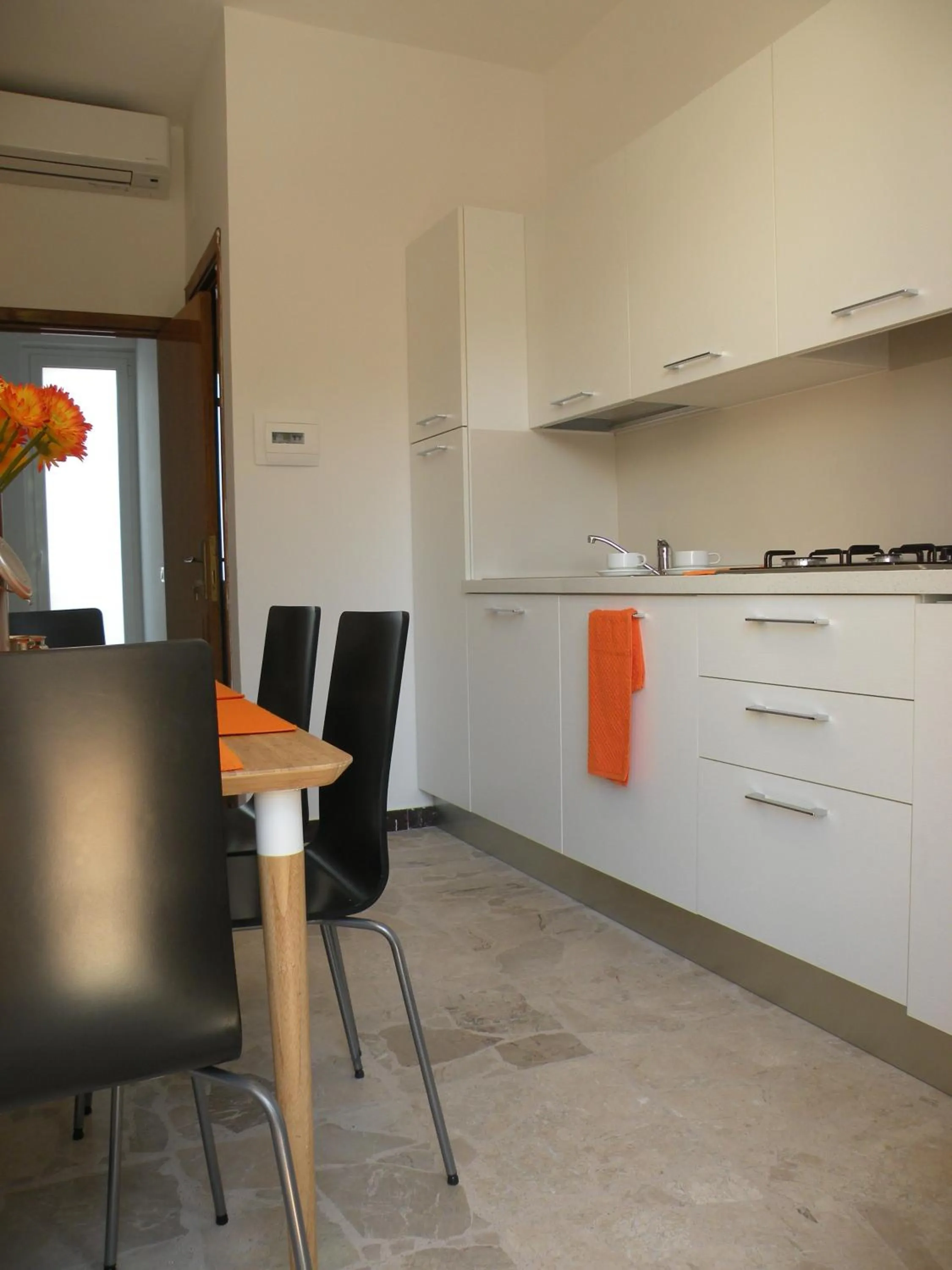 Kitchen or kitchenette in La Casa sul Corso B&B