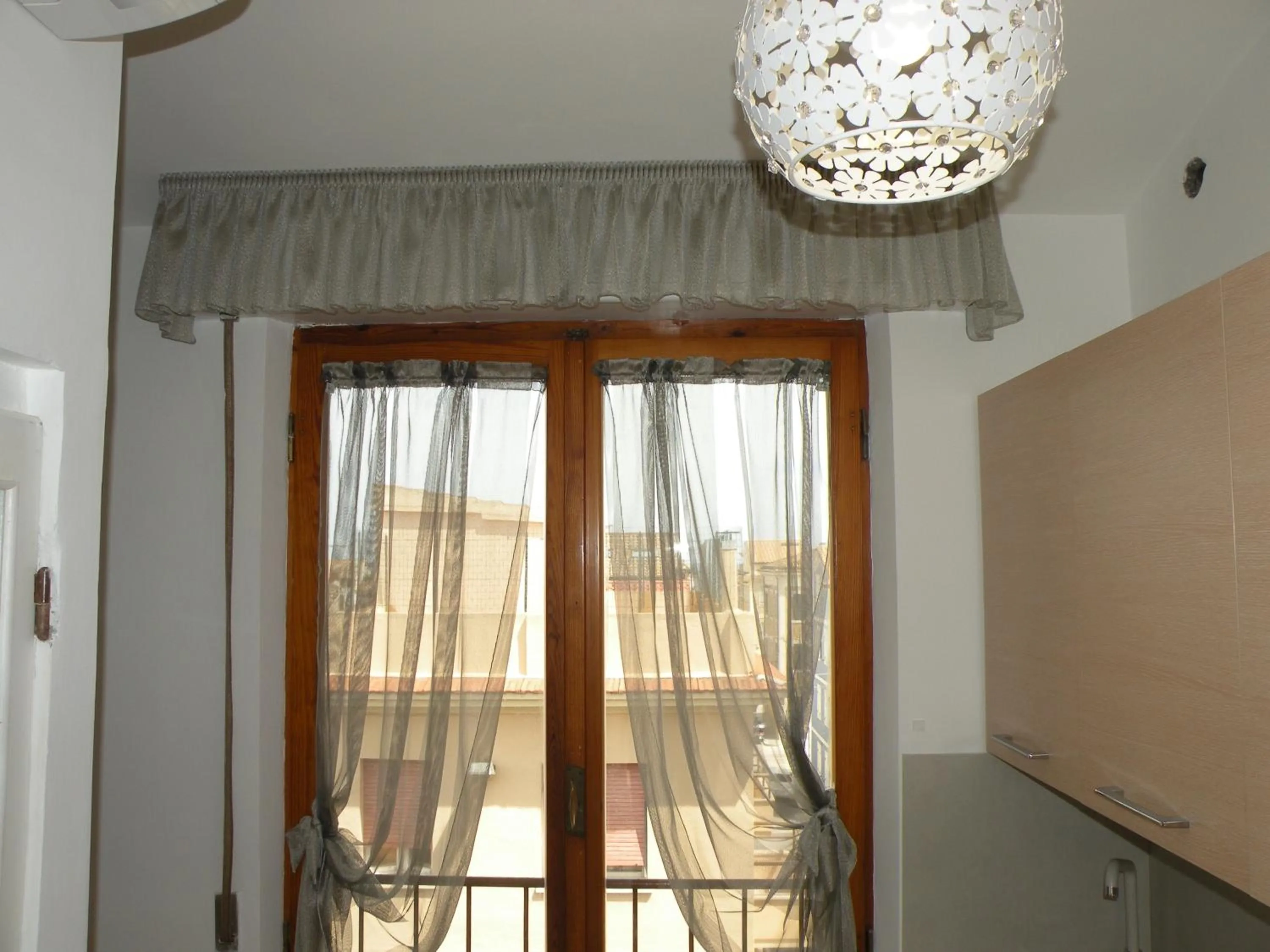 Kitchen or kitchenette in La Casa sul Corso B&B